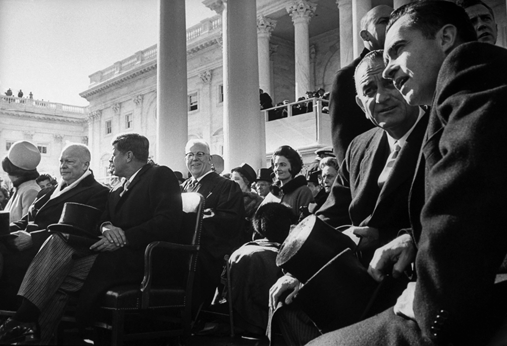 John F. Kennedy, Jacking Kennedy, Dwight Eisenhower, Lydon Johnson, and Richard Nixon wait for the inaugoration to begin.