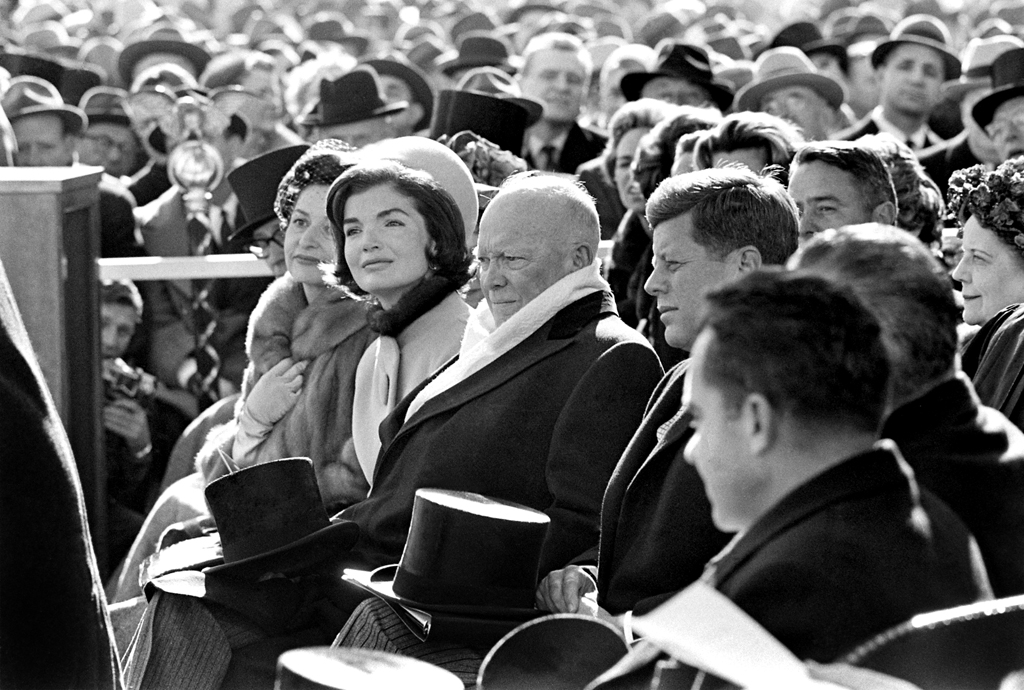Lady Bird Johnson, Jackie Kennedy, Dwight Eisenhower, John Kennedy, Lyndon Johnson and Richard Nixon seated during the inauguration.