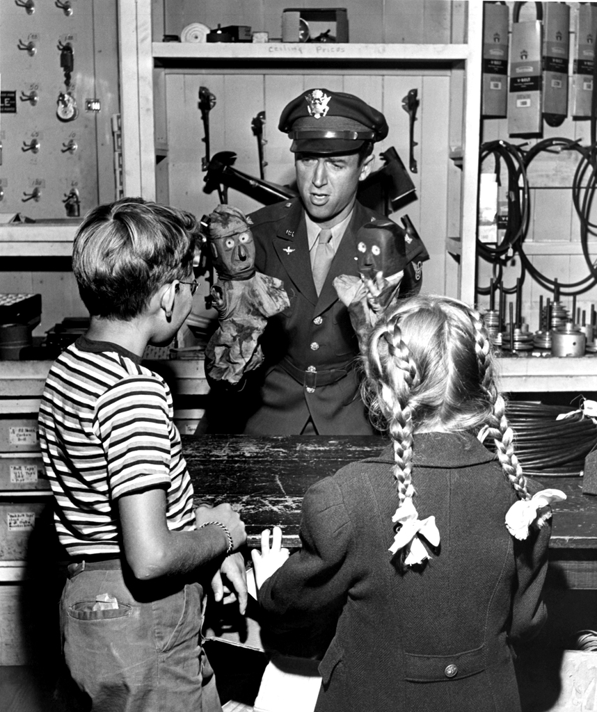 Jimmy Stewart entertains some local children, Indiana, Pa., 1945.
