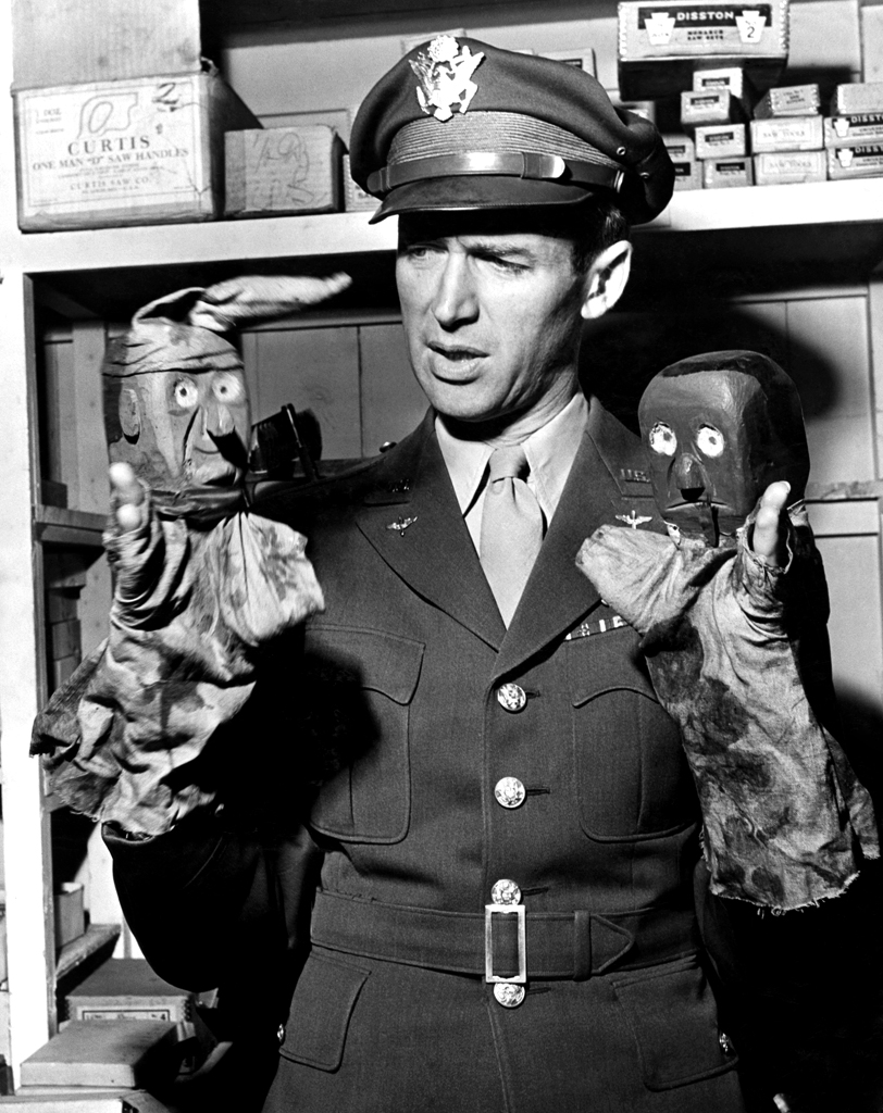 Jimmy Stewart and hand puppets, 1945