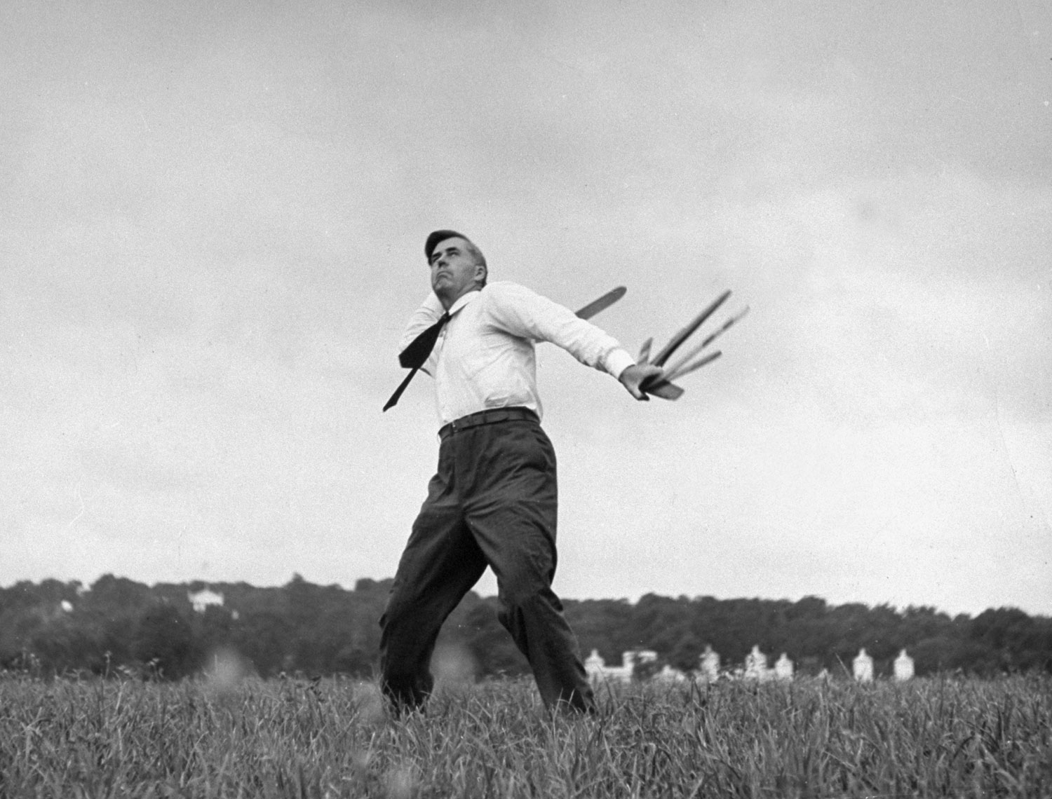 Vice Presidential candidate Henry A. Wallace throws a boomerang in a field in January 1940.