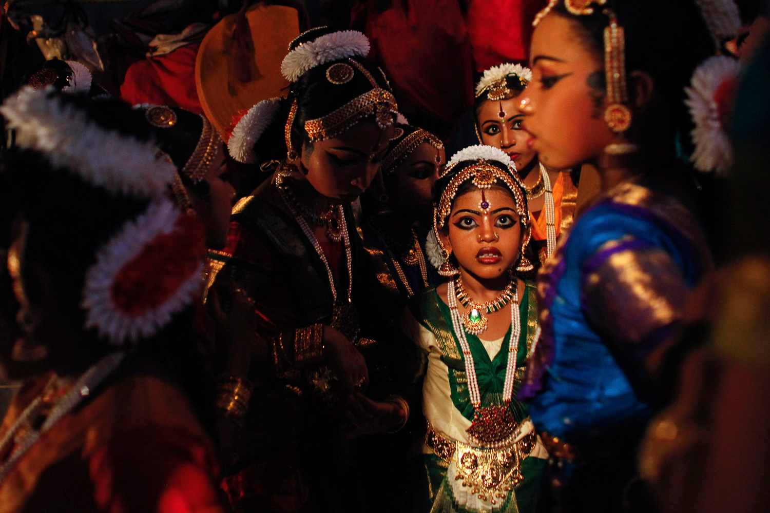 Feb. 20, 2012. Schoolgirls wait backstage before a performance of Indian classical dance on the occasion of the Mahashivratri festival in Thiruvananthapuram, capital of the southern Indian state of Kerala.