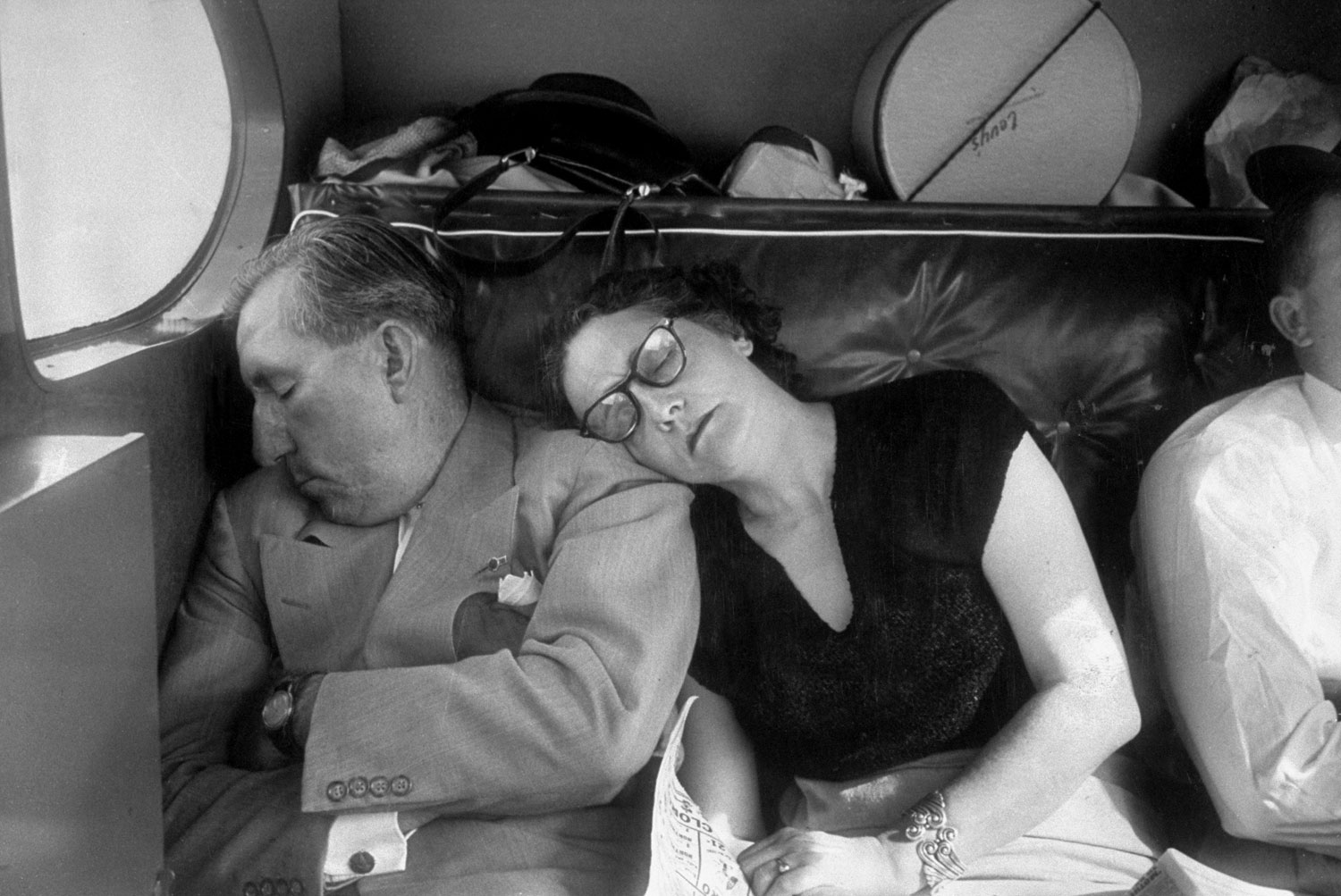 Claude D. Pepper naps with his wife in the back seat of a chartered plane as they fly home after his last campaign speech in May 1950.