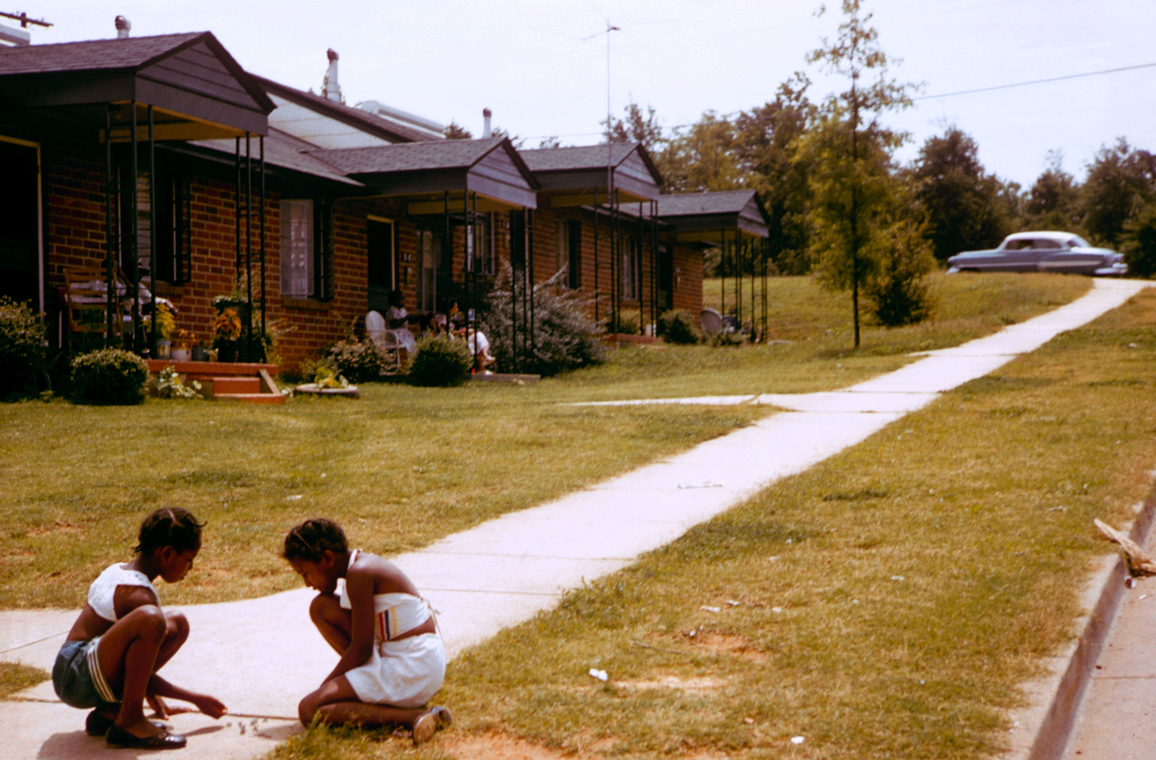 Children play in a segregated neighborhood, Greenville, South Carolina, 1956.
