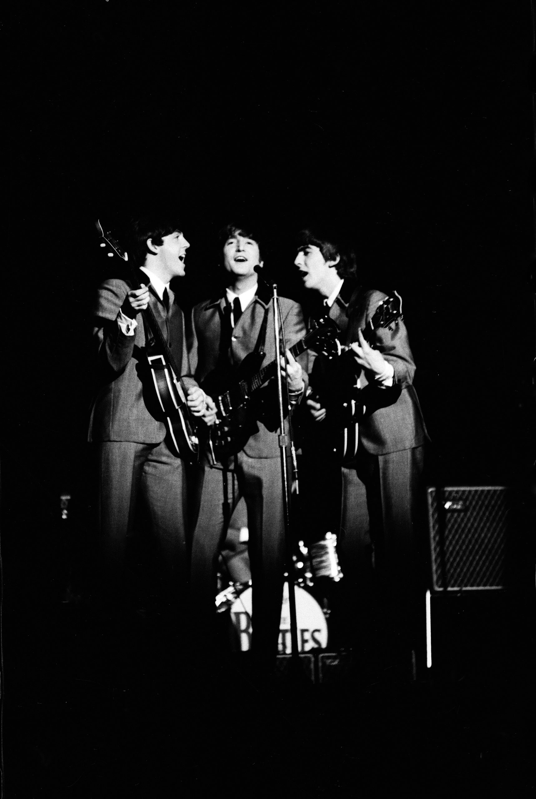 Beatles concerts, like this American show in 1964, are noisy affairs where screaming crowds drown out the band.