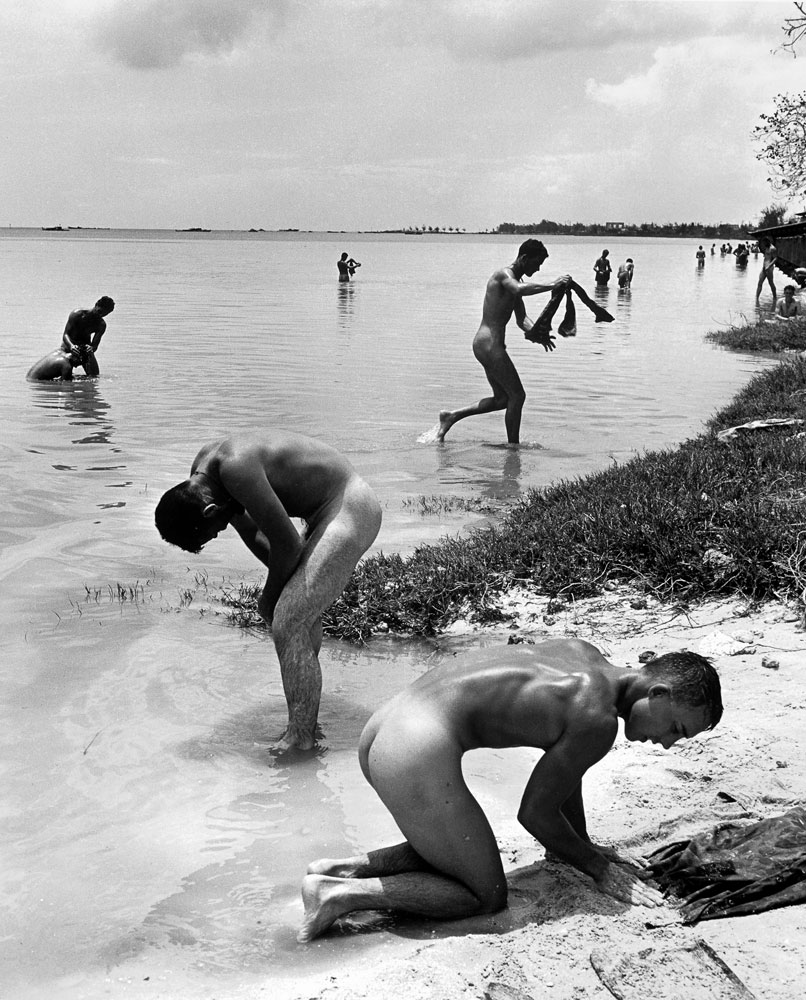 American troops in the Pacific bathe during a lull in the fighting on the island of Saipan, 1944.