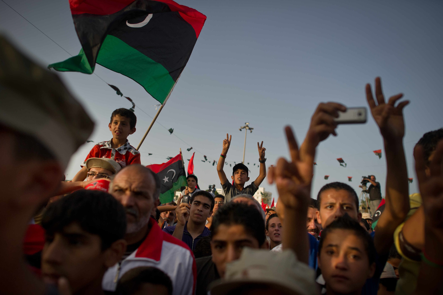 Oct. 25, 2011. Libyans in the city of Misrata celebrate following the official declaration of liberation of the entire country.