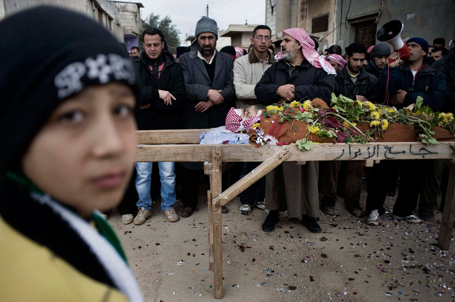 Feb. 7, 2012. Mourners at the funeral of a member of the Free Syrian Army.