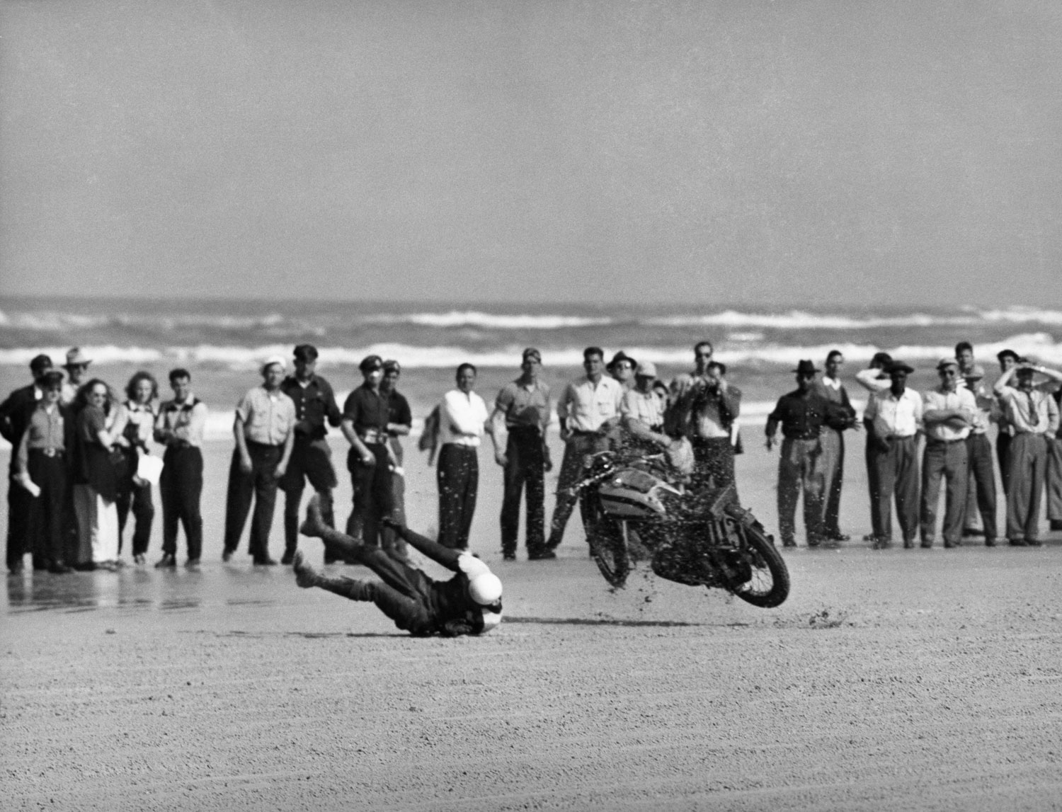 A racer and his bike violently part company in Daytona 200, 1948