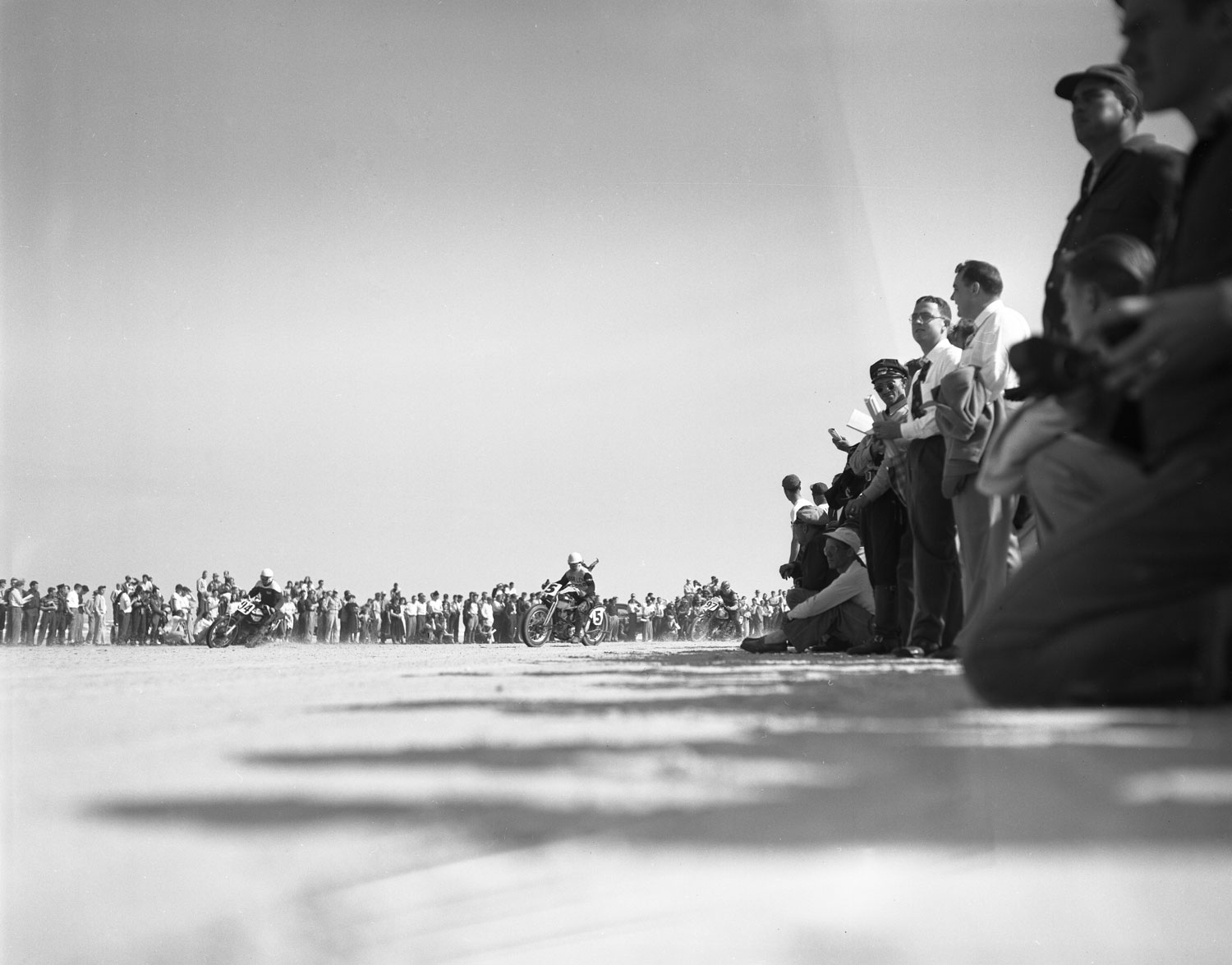 A sand crab's eye view of fans watching the races at Daytona.
