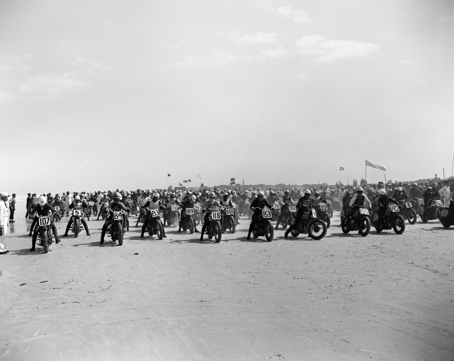 Racers line up at the celebrated Daytona 200 motorcycle race in April 1948.