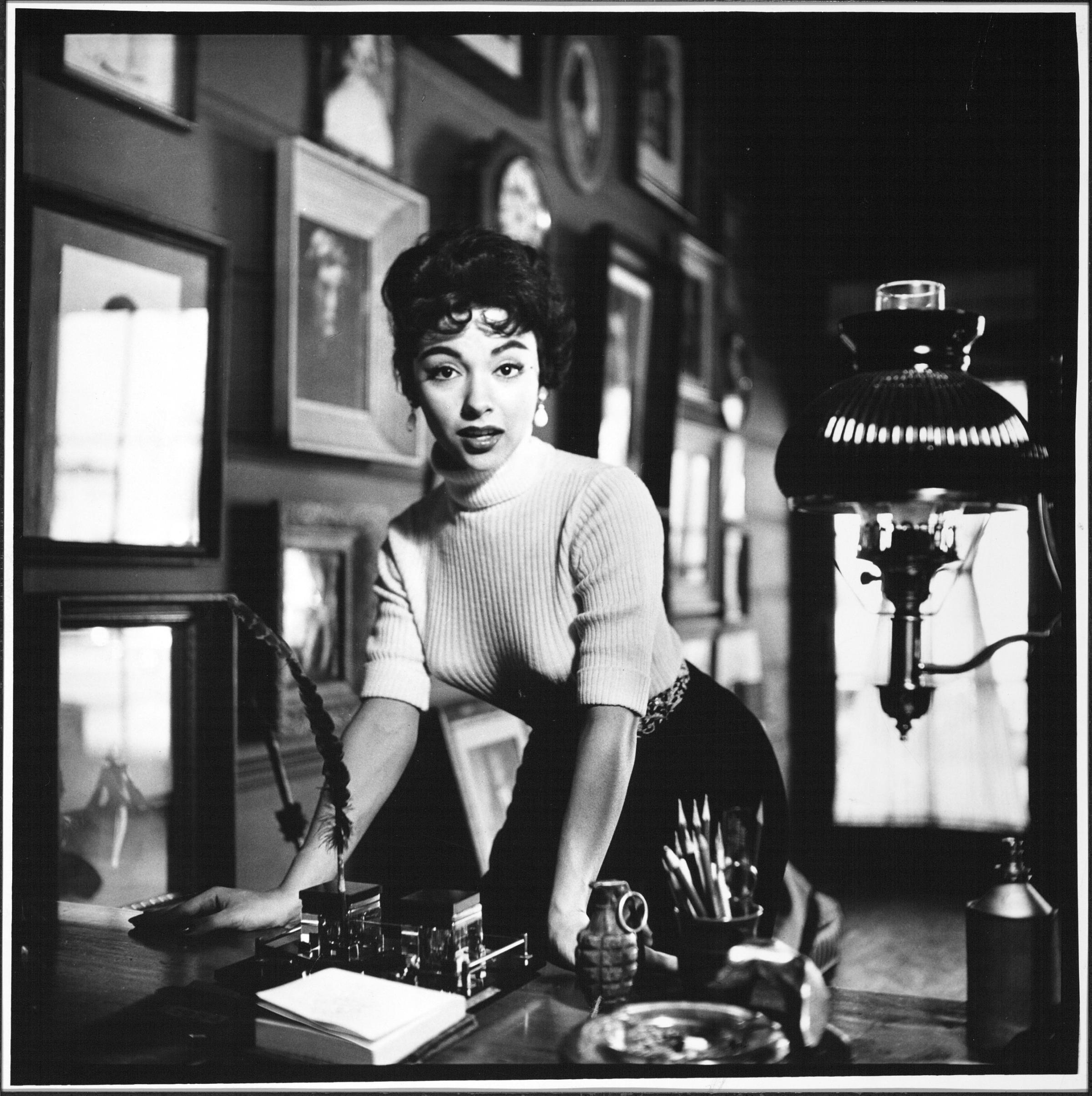 Actress Rita Moreno demonstrates the "sexy-sophisticated" type, 1954.