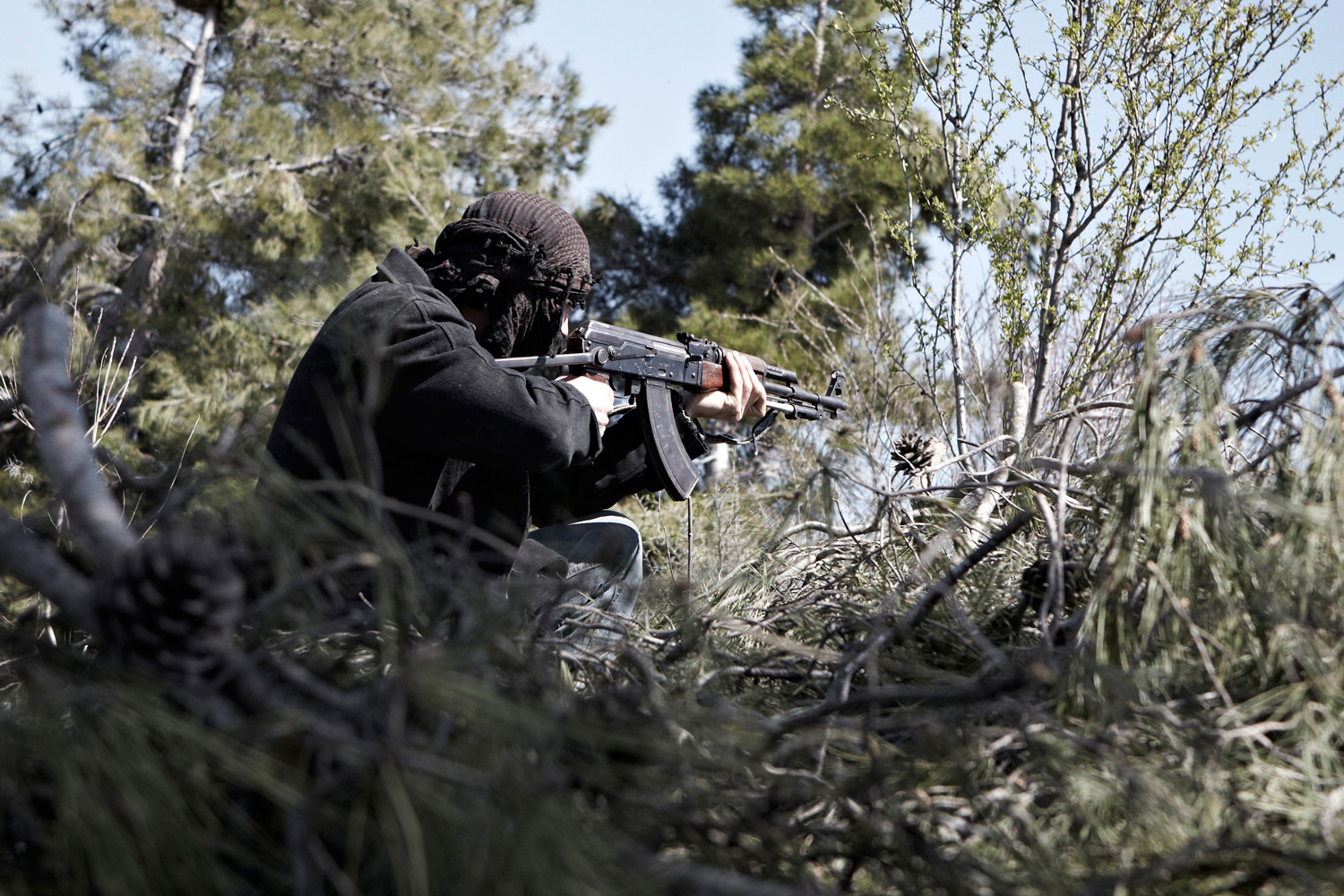 March 23, 2012. A Free Syrian Army member is on the lookout in Idlib, Syria.