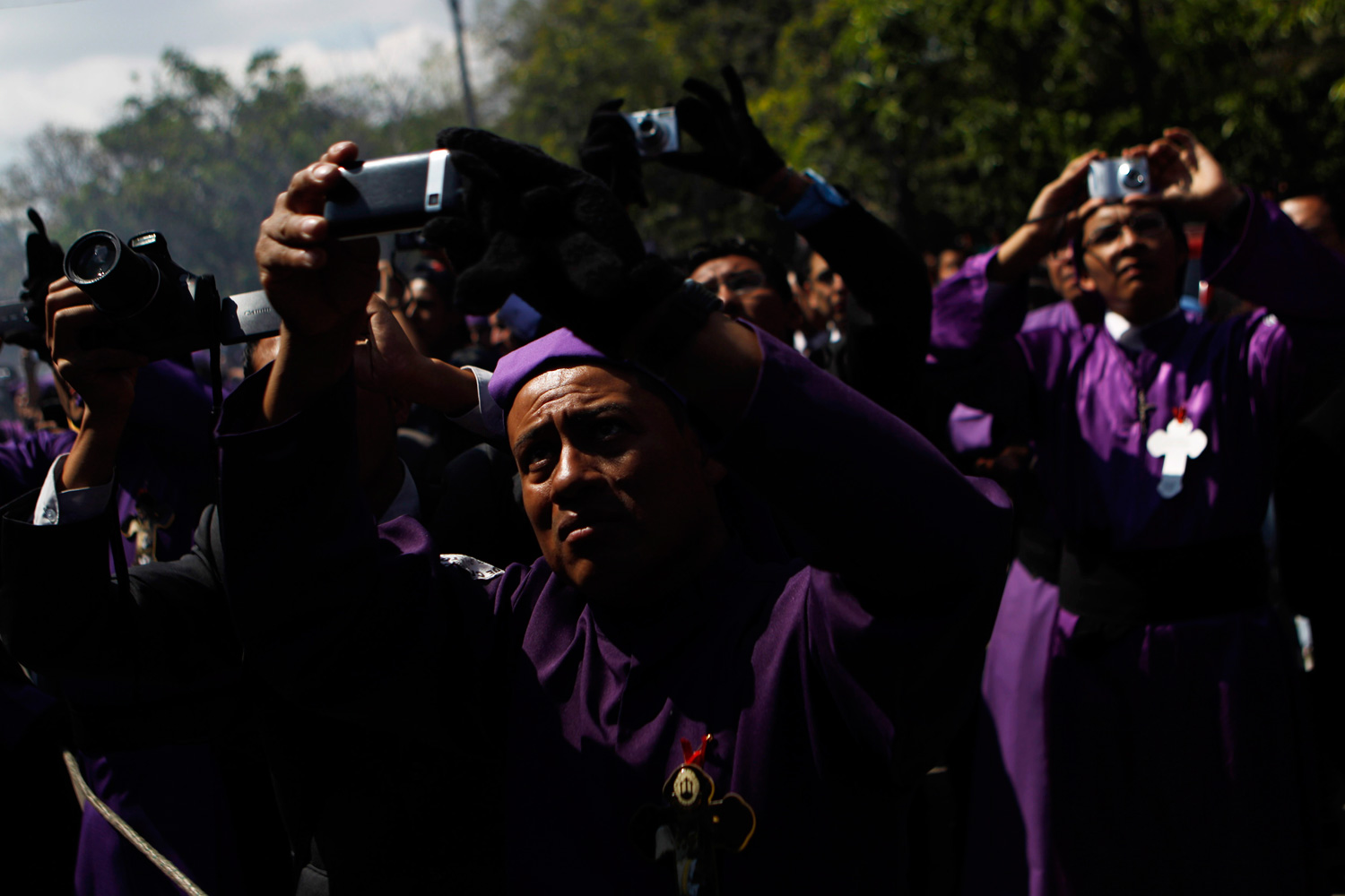 March 4, 2012. Catholics take pictures of a statue of Jesus Nazareno during a procession to mark the second Sunday of Lent, in the streets of Guatemala City.