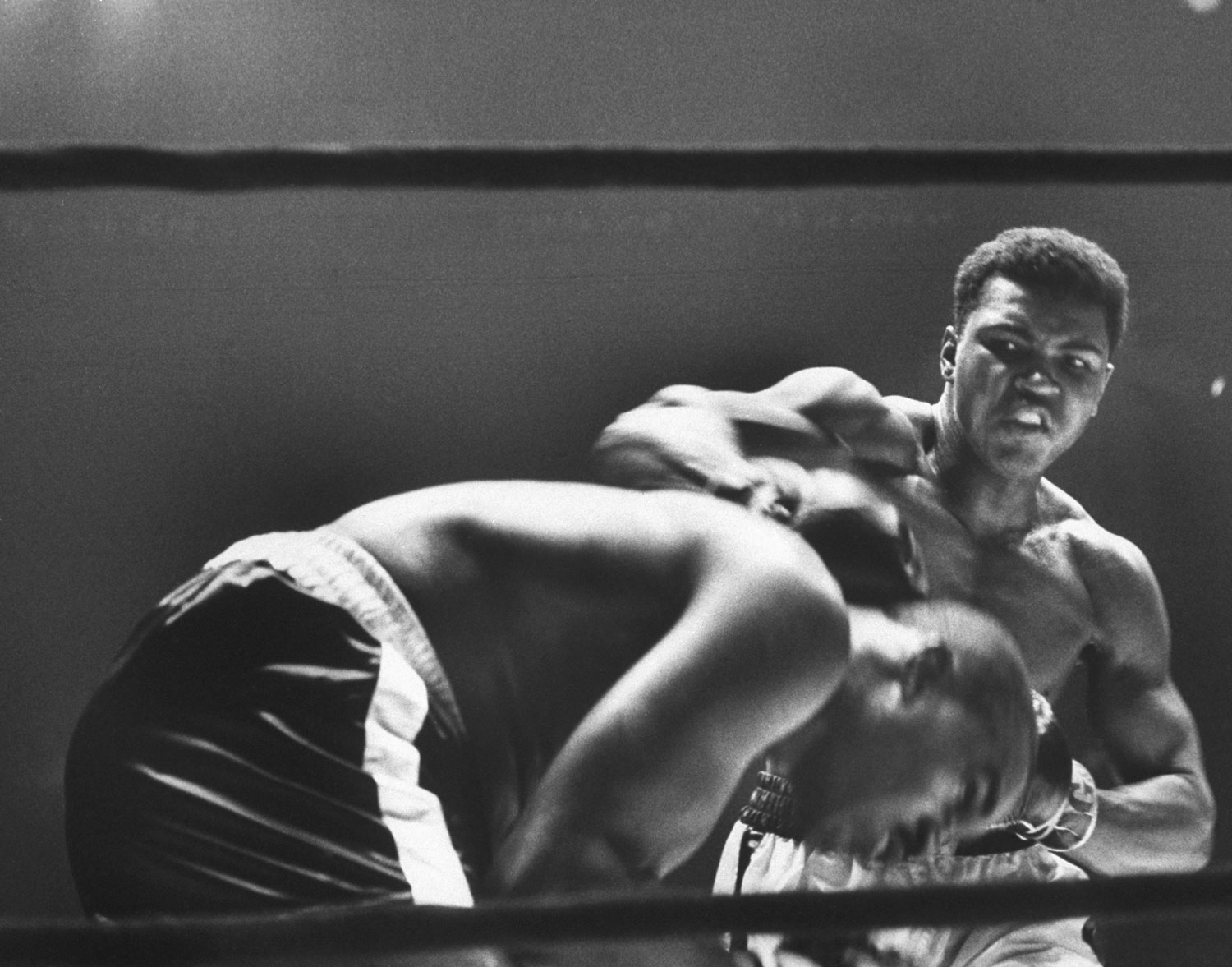 Heavyweight bout in which Cassius Clay (R) (later Muhammad Ali) narrowly defeated Doug Jones.