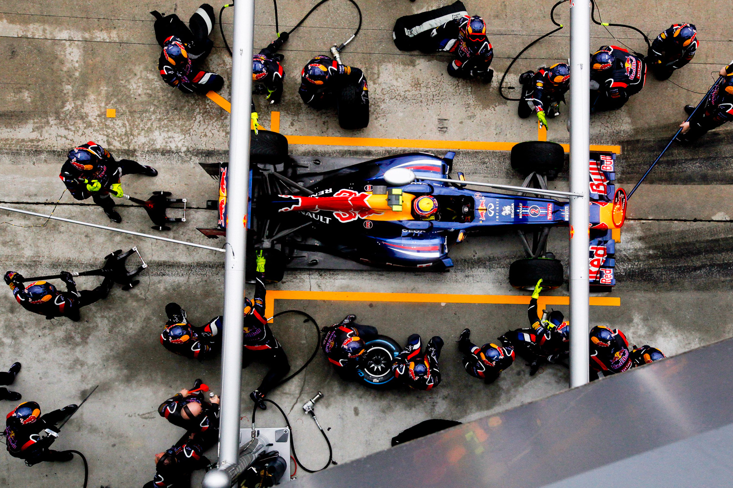March 25, 2012. Australian Formula One racer Mark Webber, of Red Bull Racing, arrives at a pitstop during the 2012 Formula One Grand Prix of Malaysia at the Sepang International circuit, outside Kuala Lumpur.