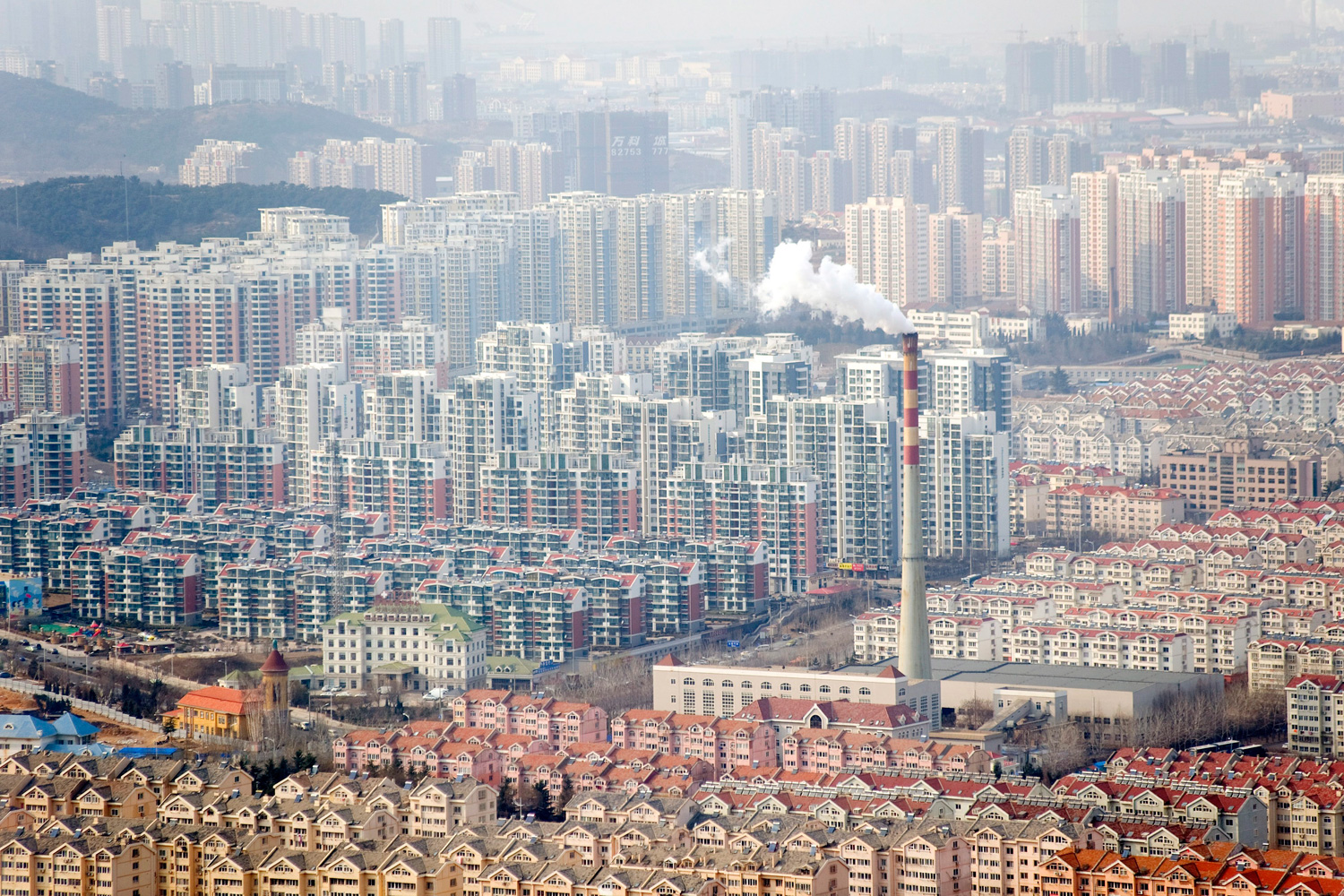 March 2, 2012. A general view shows many residential buildings in downtown Qingdao city in eastern China's Shandong province.
