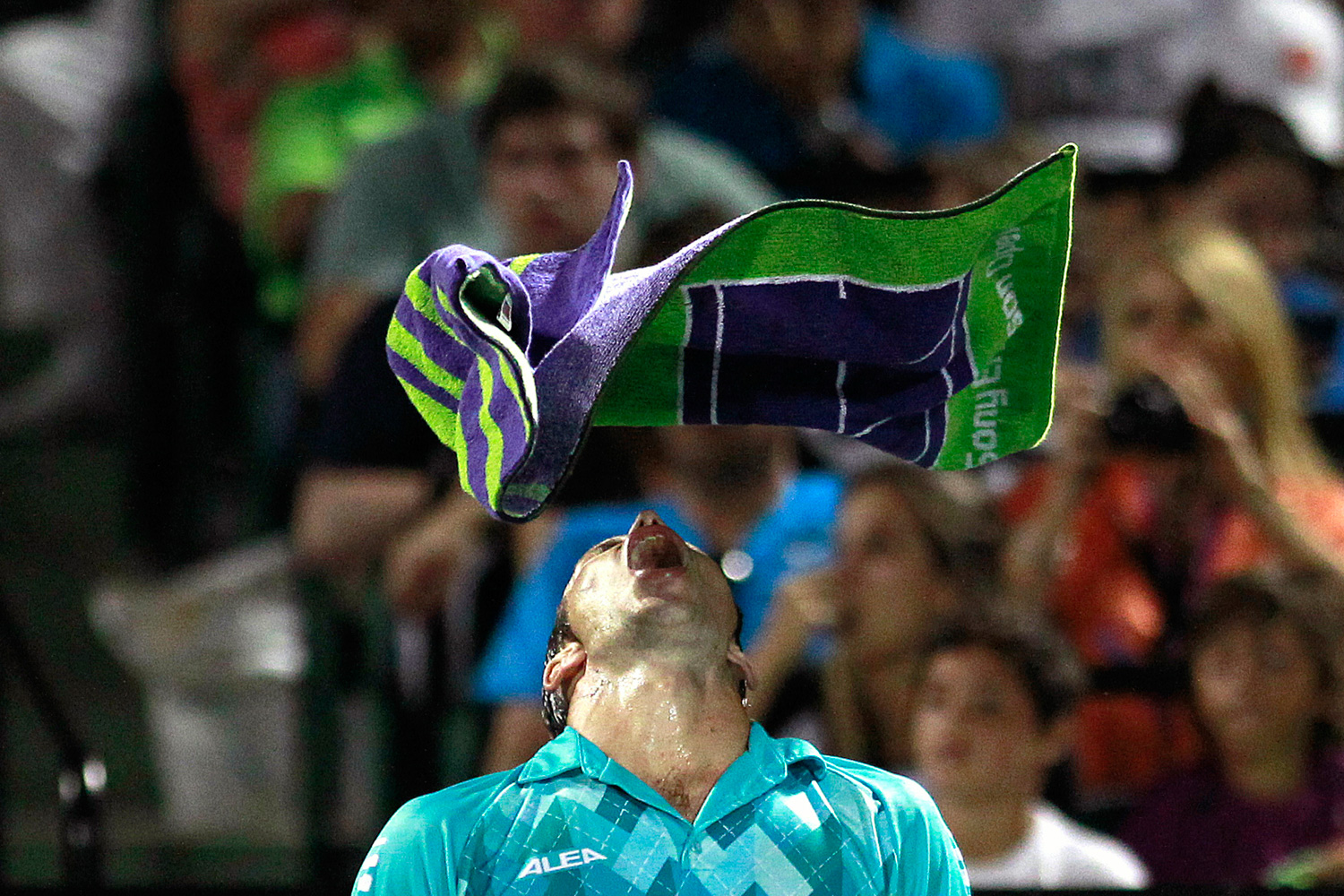 March 25, 2012. Stepanek of the Czech Republic throws his towel over his head  after losing a challenge to Nadal of Spain during their men's singles match at the Sony Ericsson Open tennis tournament in Key Biscayne, Fla.