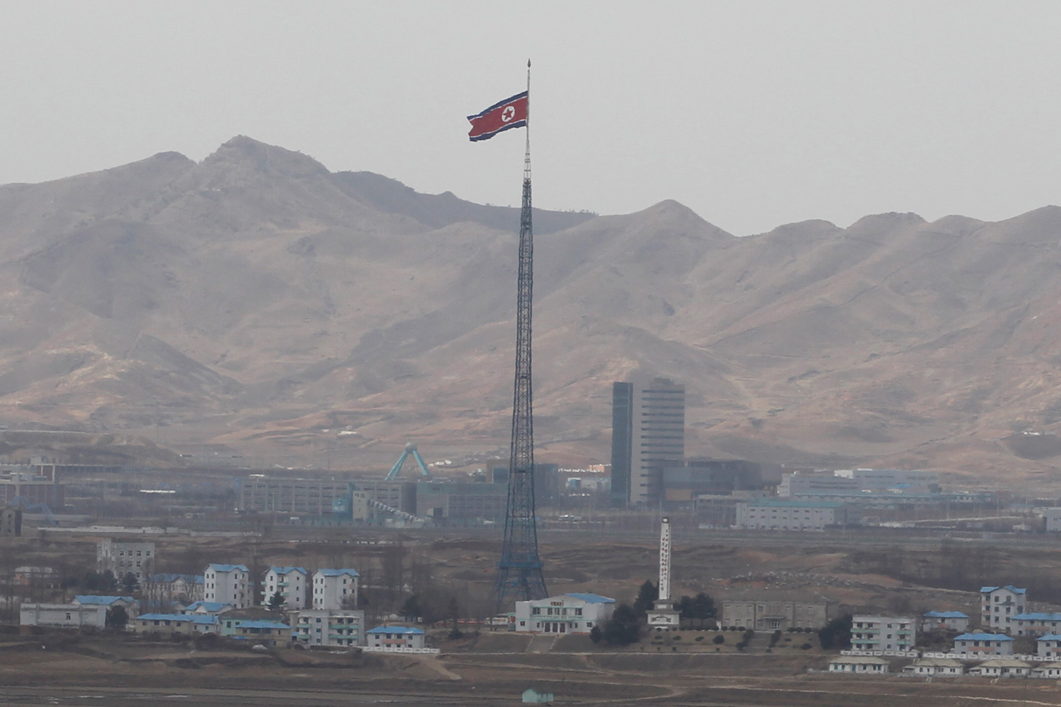 March 25, 2012. A North Korean flag is hung at half-mast at the propaganda village of Gijungdong in this photo taken from Observation Post Ouellette after U.S. President Barack Obama's visit to the truce village of Panmunjom in the demilitarised zone (DMZ) separating the two Koreas, north of Seoul.