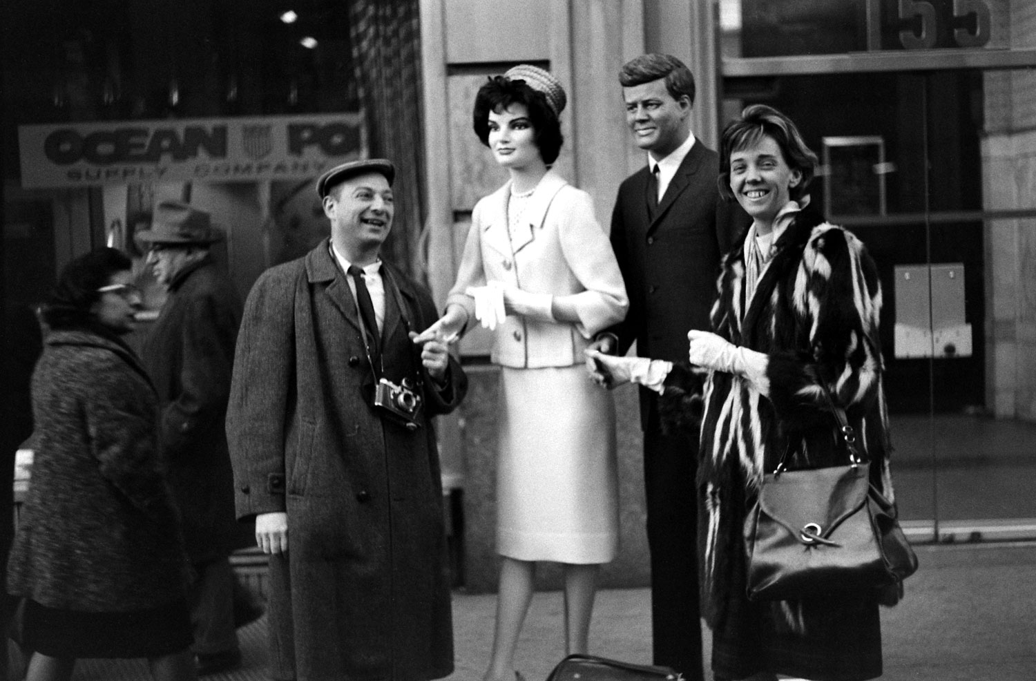 LIFE photographer Yale Joel and an unidentified woman pose with Jackie and JFK mannequins, 1961.