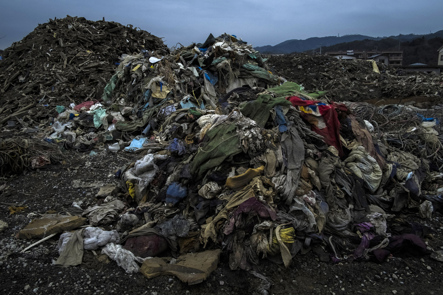 March 8, 2012. Debris and non recyclable home items lay strewn over the ground where houses and factories once stood in Kesennuma, Japan.