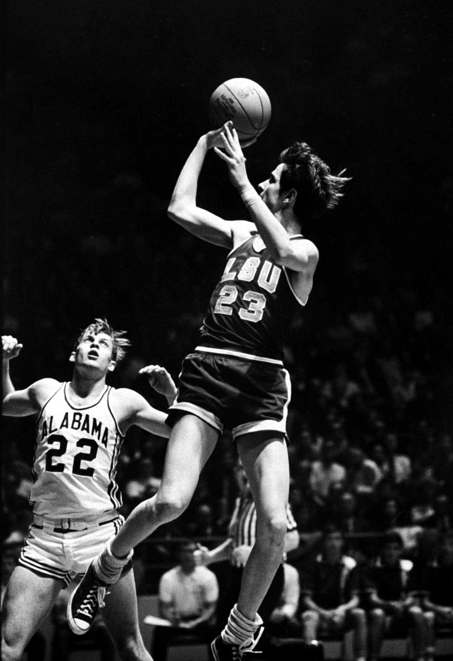 Pete Maravich (LSU) fires off a fade-away jumper against Alabama in 1969.