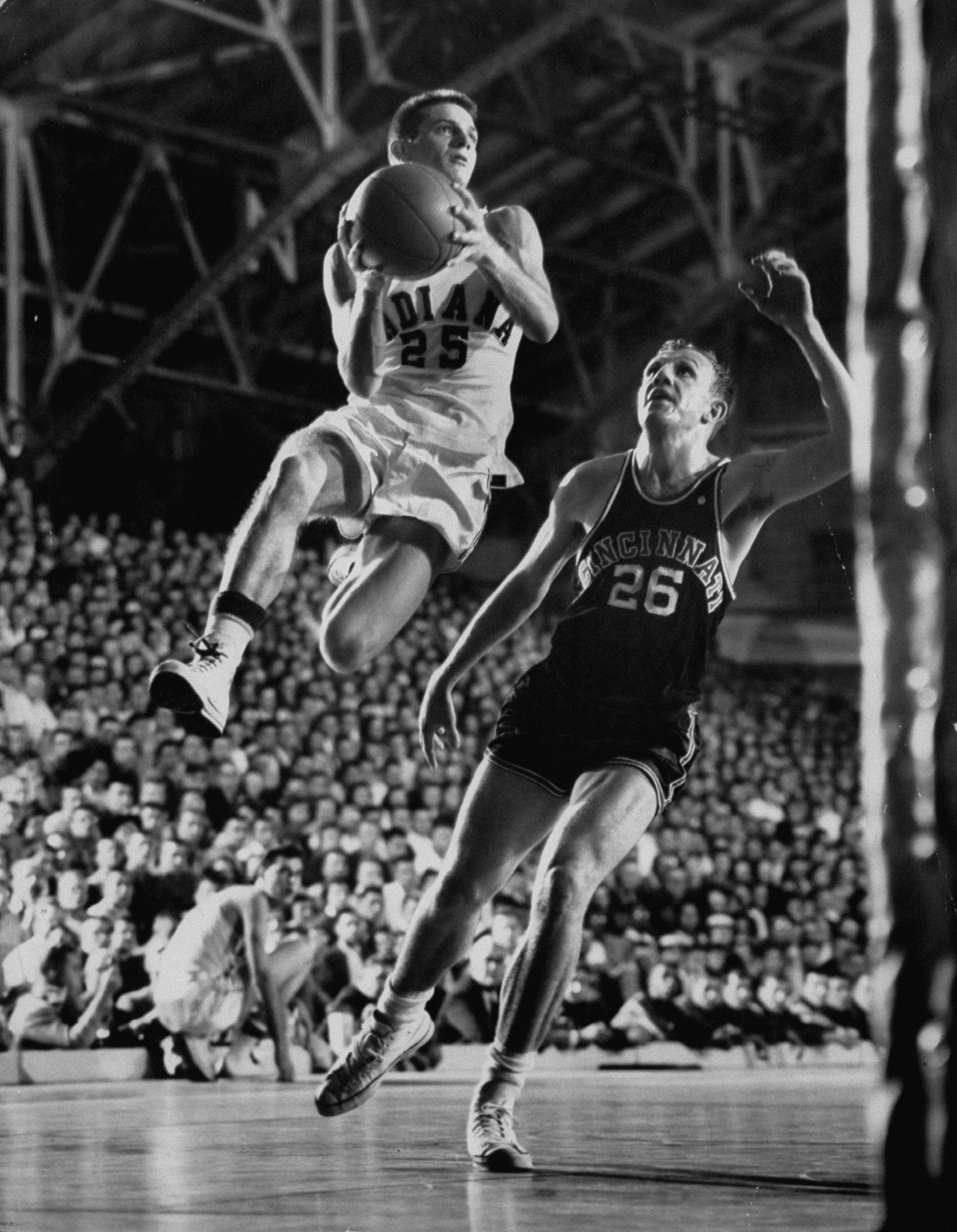 Burke Scott (above, with ball) was a starter on Indiana's 1953 NCAA championship team, the second of Indiana's five title winners.