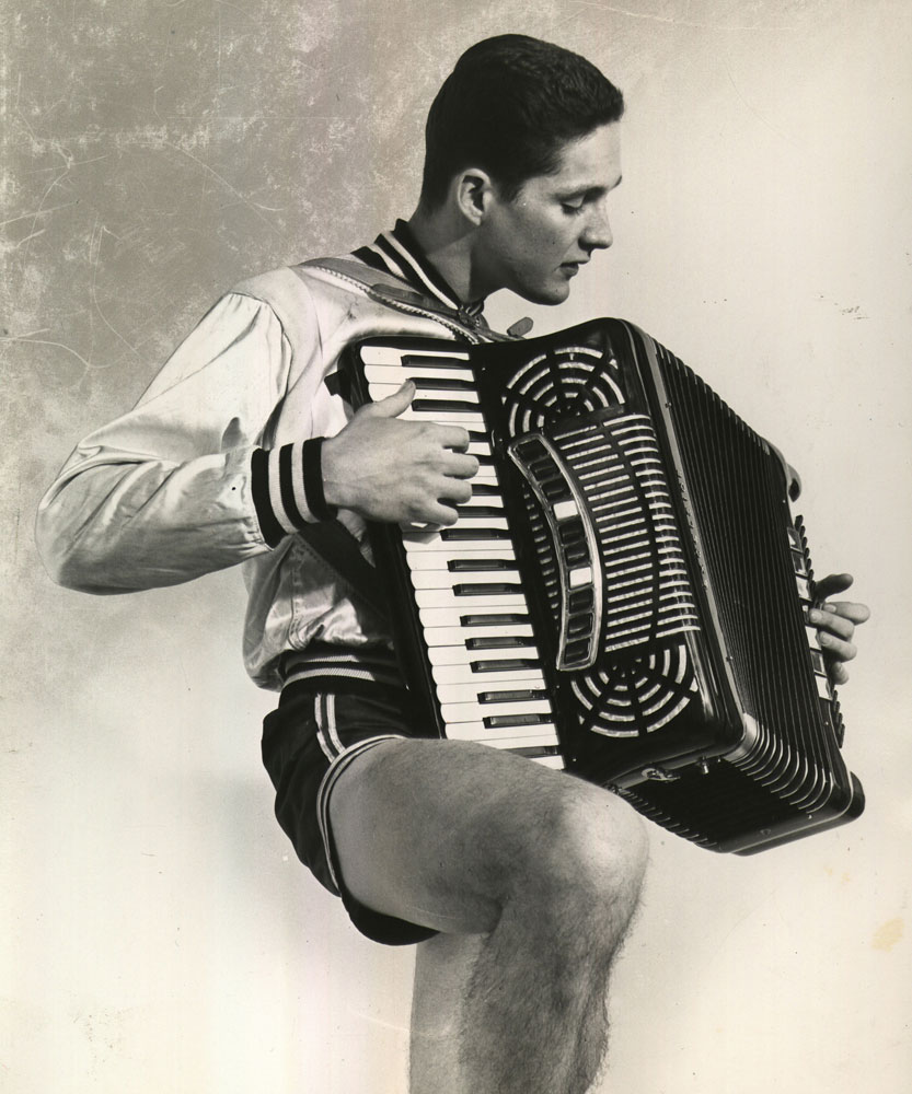 Yale basketball star Tony Lavelli playing the accordion
