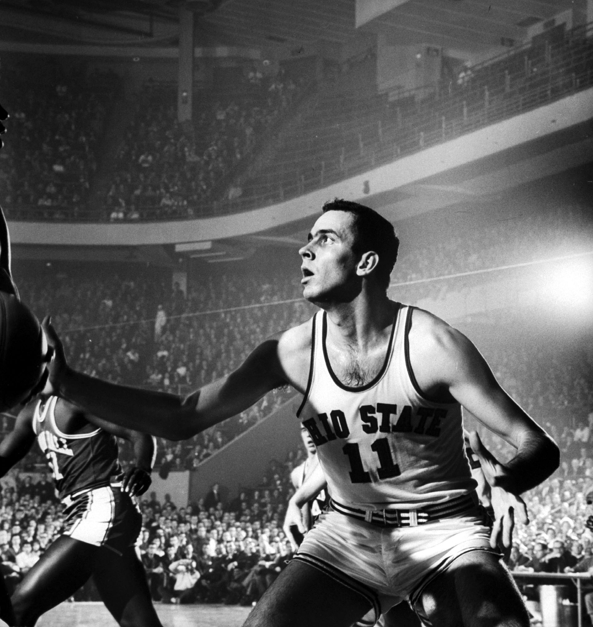 The 6' 8" Jerry Lucas (above, in 1960) is still regarded as one of the best big men in the history of the game. In three college seasons with Ohio State he averaged 24.3 points and 17.2 rebounds and led the Buckeyes to three NCAA title games. They won it all in 1960.