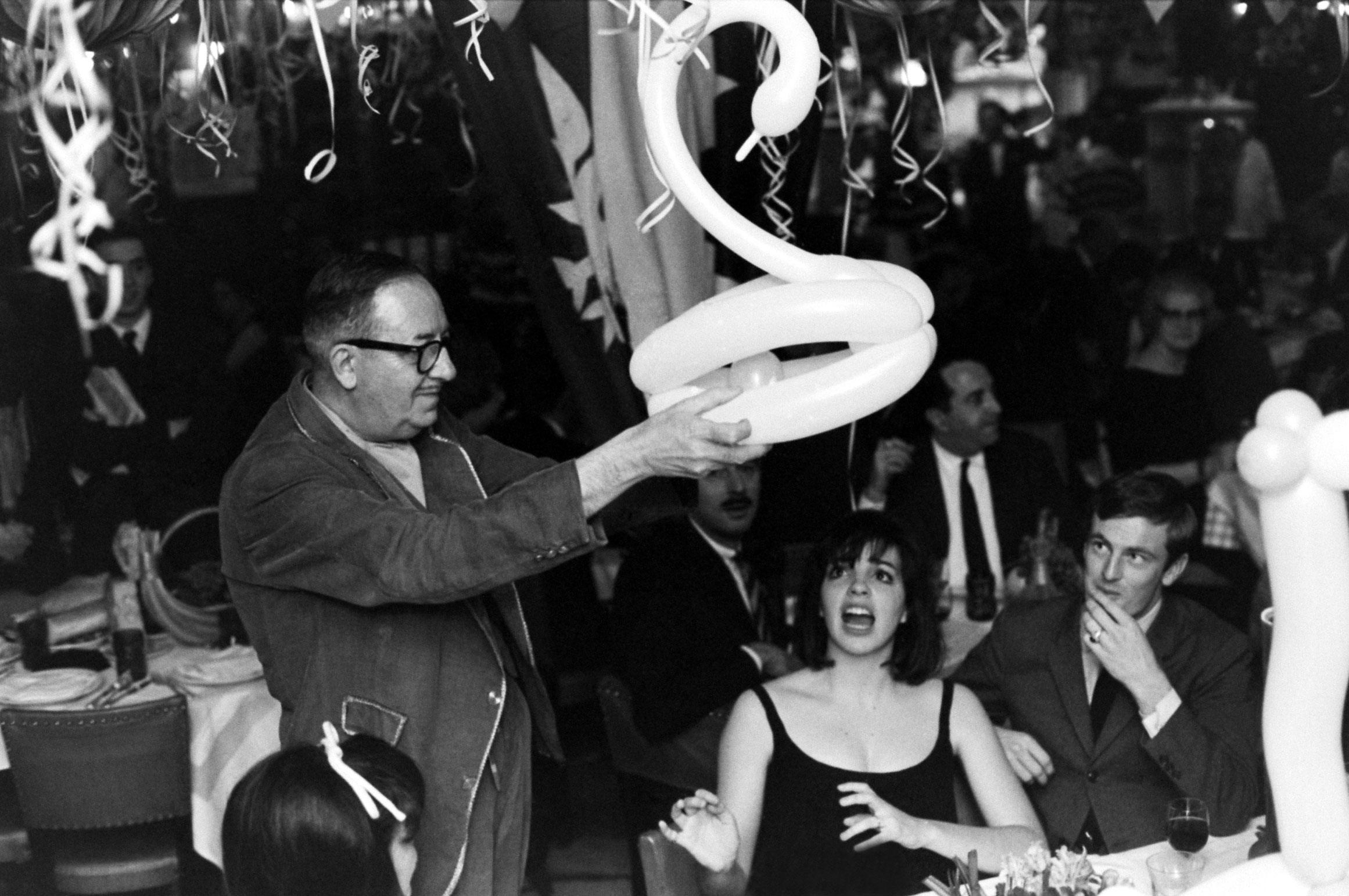 Liza Minnelli reacts as an unidentified well-wisher at her 19th birthday party presents her with a swan-shaped balloon.
