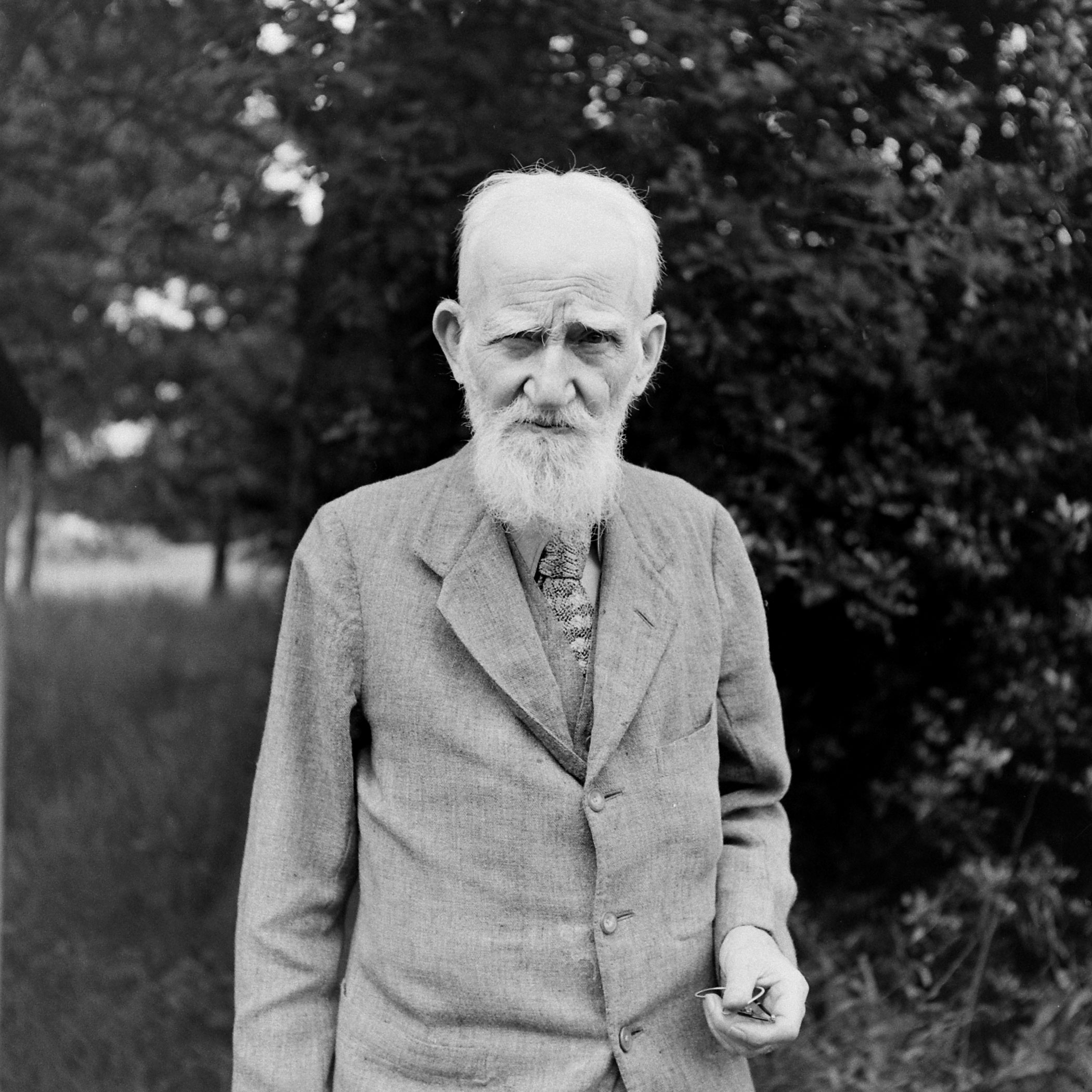 George Bernard Shaw, 90 years old, stands in the yard of his home in the Hertfordshire village of Ayot St. Lawrence, England, in 1946.