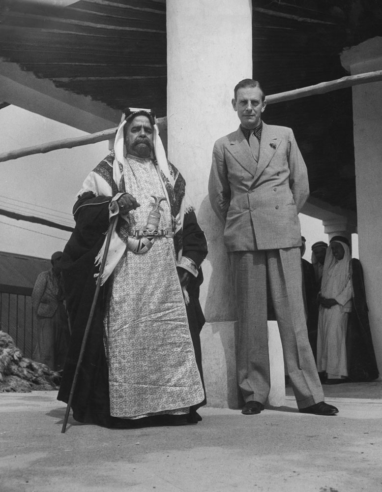 Sheik of Bahrain, Sir Sulman-Bin-Hamad-Bin Isa Al Khalifa, poses with British adviser C. Dalyrymple Belgrave, power behind the throne.
