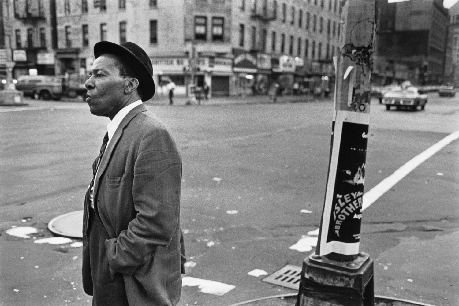 A Man on the Corner of Lenox Ave. &amp; 125th St., Harlem, NY, c. 1976