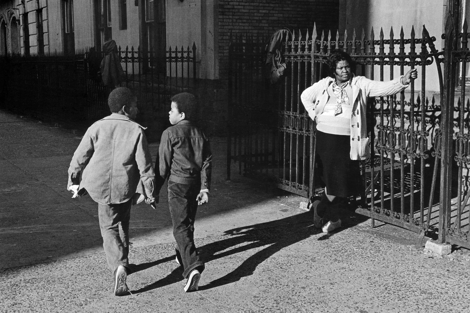 A Woman and Two Boys Passing, 1978