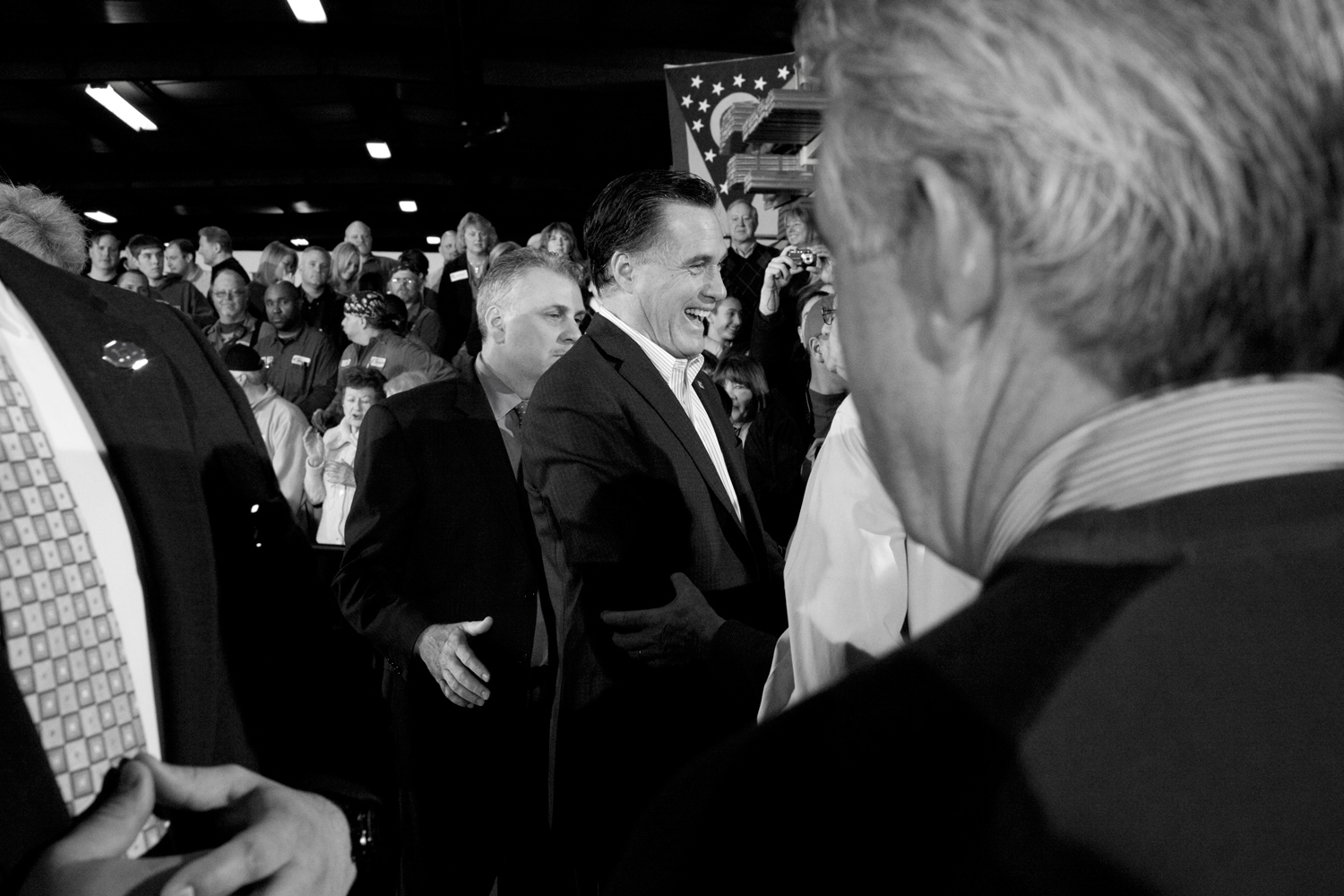 March 5, 2012. Mitt Romney shakes hands with supporters at Gregory Industries in Canton, Ohio.