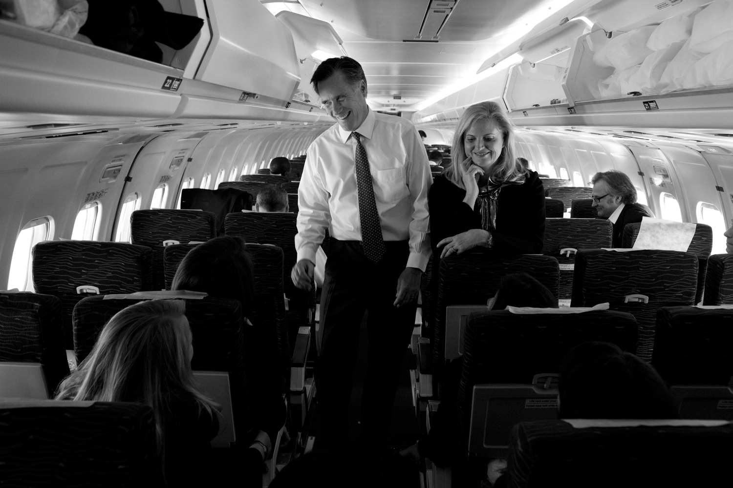 March 6, 2012. Republican presidential candidate Mitt Romney and his wife Ann talk to reporters on his campaign plane in Columbus, Ohio, before taking off for Boston.
