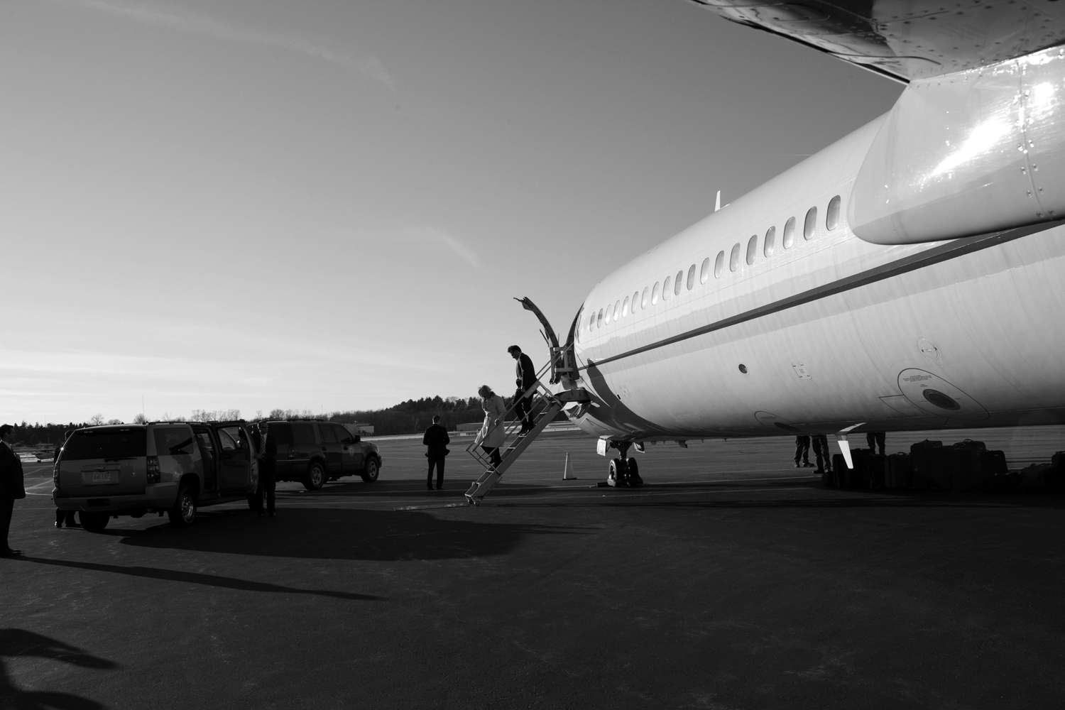March 6, 2012.  Mitt Romney walks off his campaign plane with his wife Ann at Bedford Hanscom Field in Bedford, Mass., as he traveled to Boston to hold a Super Tuesday party.