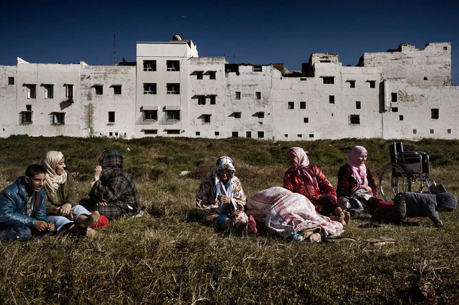 March 2012. Families spend their time outside in Sale, Morocco.
