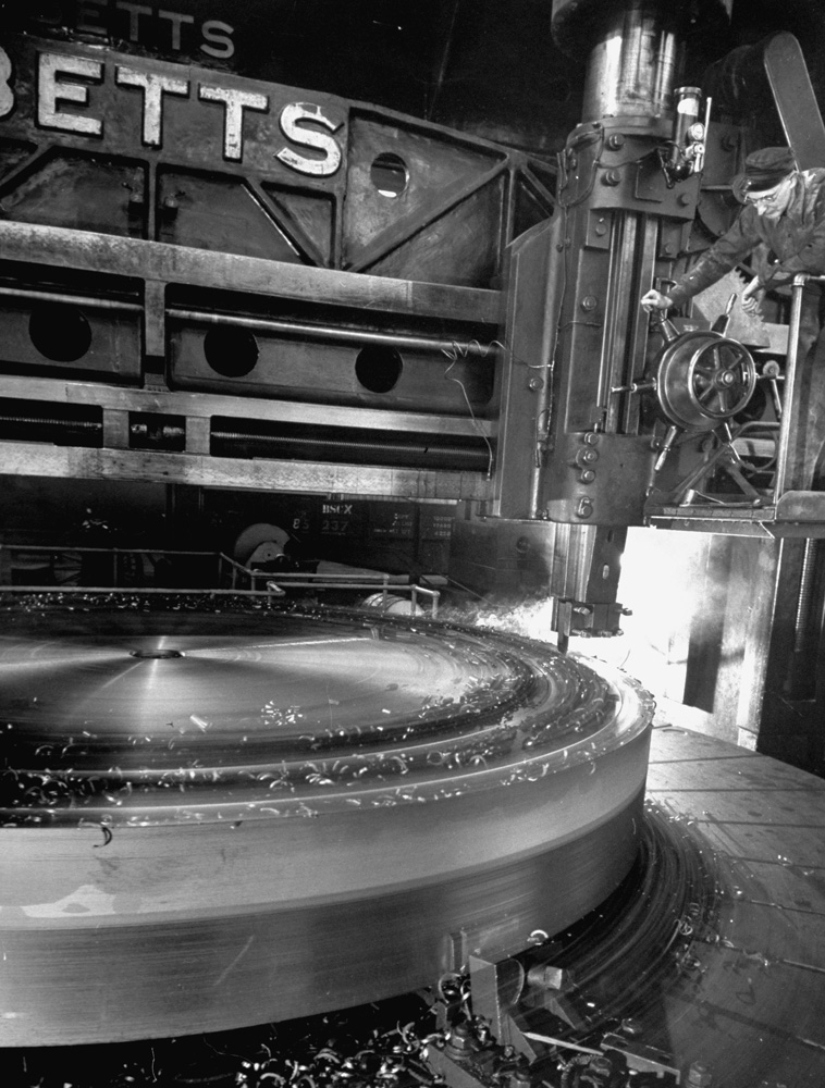 Carving and shaping a cyclotron's enormous magnet, Pennsylvania, 1948.