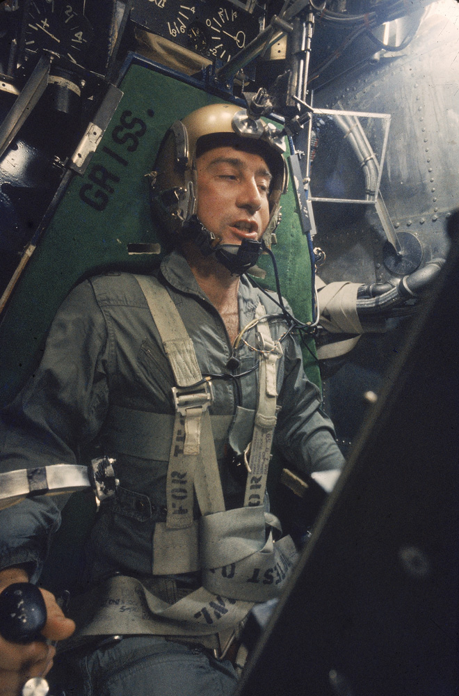 Astronaut Virgil "Gus" Grissom strapped into a centrifuge during a simulated space flight, 1959.