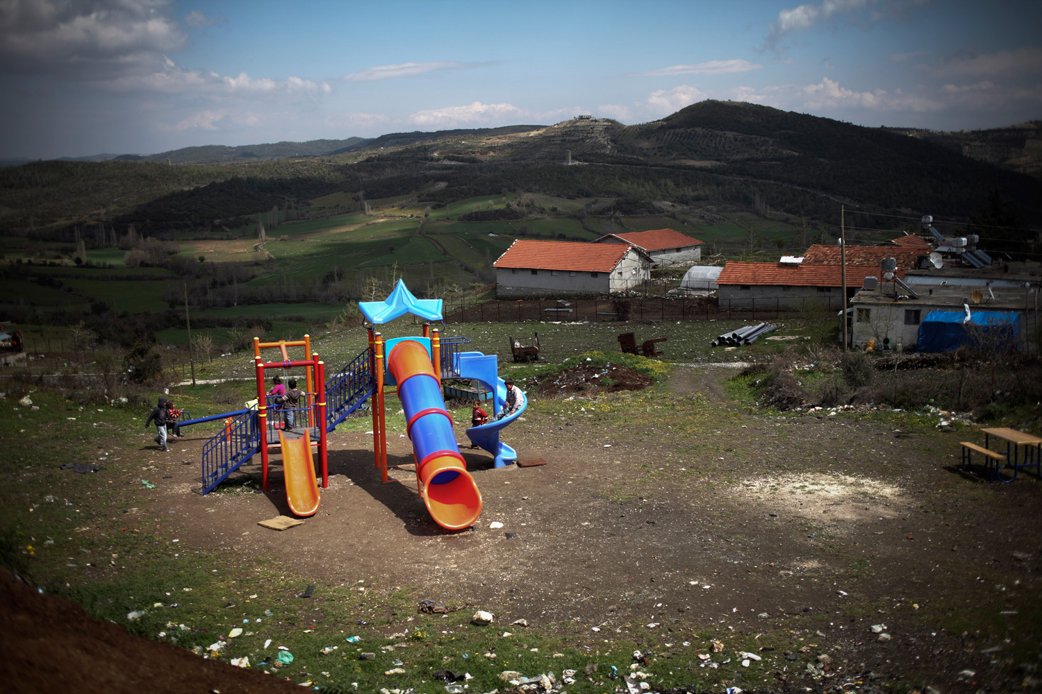 March 31, 2012. Children play on a gym set in a village 50km from Antakya in southern Turkey near the border with Syria.