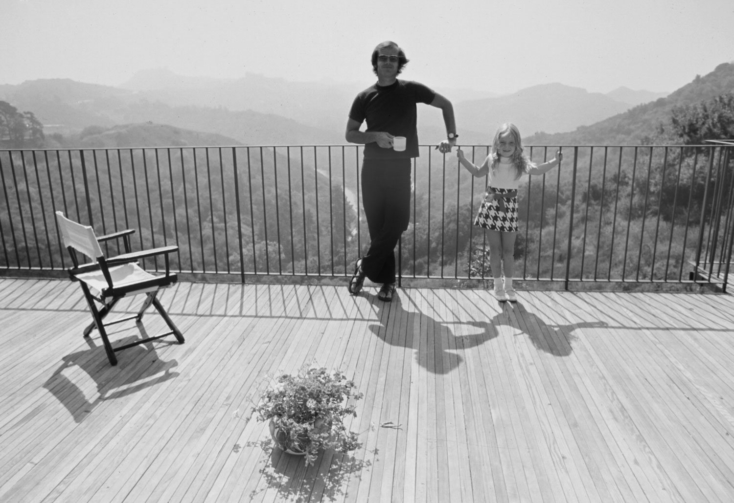 Jack Nicholson and his daughter, Jennifer, on the deck of his home overlooking Franklin Canyon, Los Angeles, 1969.