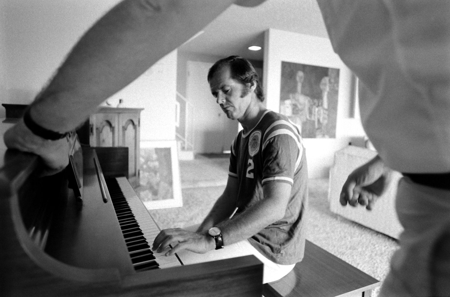 Jack Nicholson at home in 1969, taking his first piano lesson with teacher Josef Pacholczyk