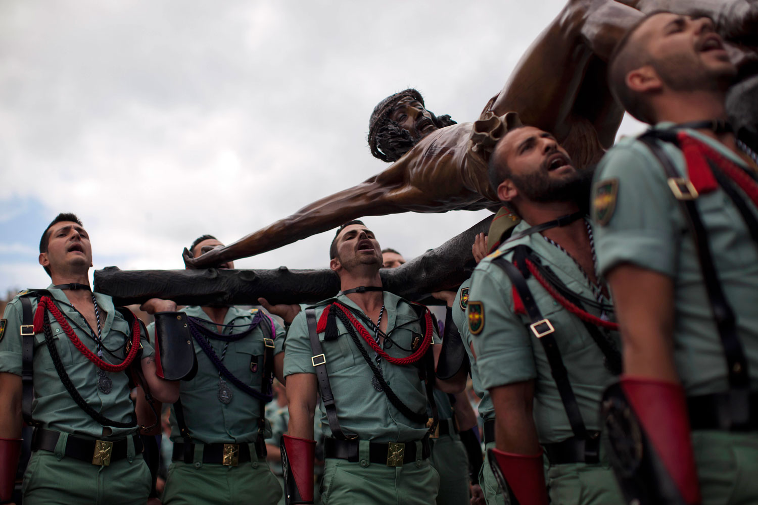 April 5, 2012.Members of the Spanish Legion, an elite unit of the Spanish Army, carry El Cristo de la Buena Muerte, or Christ of the Good Death, during a ceremony ahead of a procession in Malaga, southern Spain. Hundreds of processions take place throughout Spain during the Easter Holy Week.