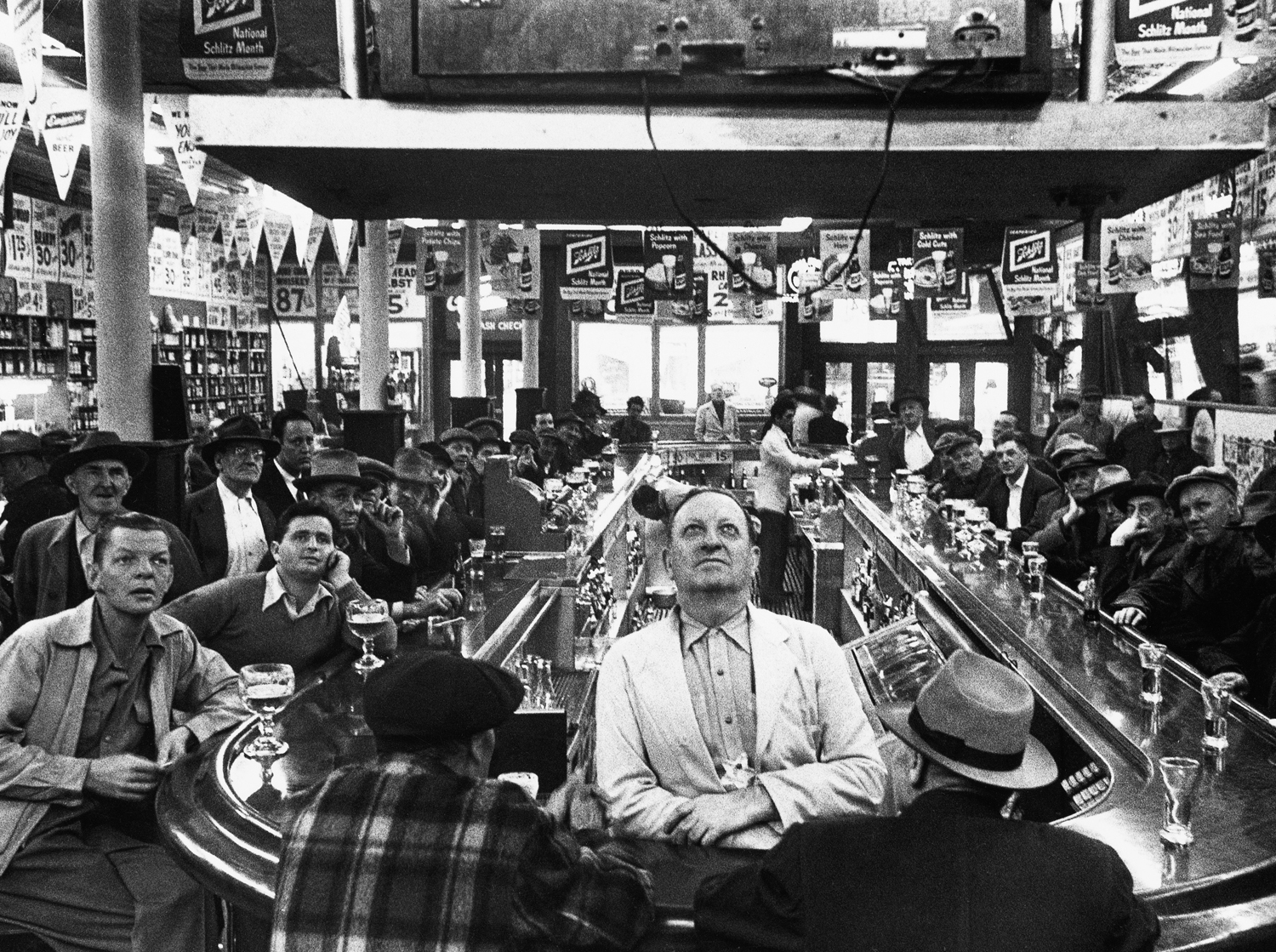 A rapt audience in a Chicago bar watches the 1952 Subway Series between the Yankees and Dodgers in 1952.