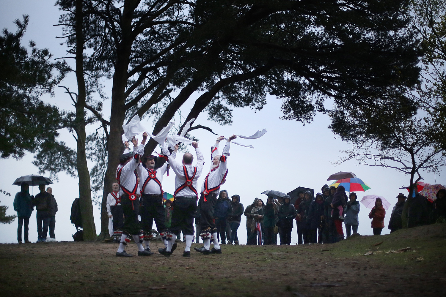 May 1, 2012. Pilgrim Morris Men dance on St. Martha's Hill at dawn in Chilworth, England.