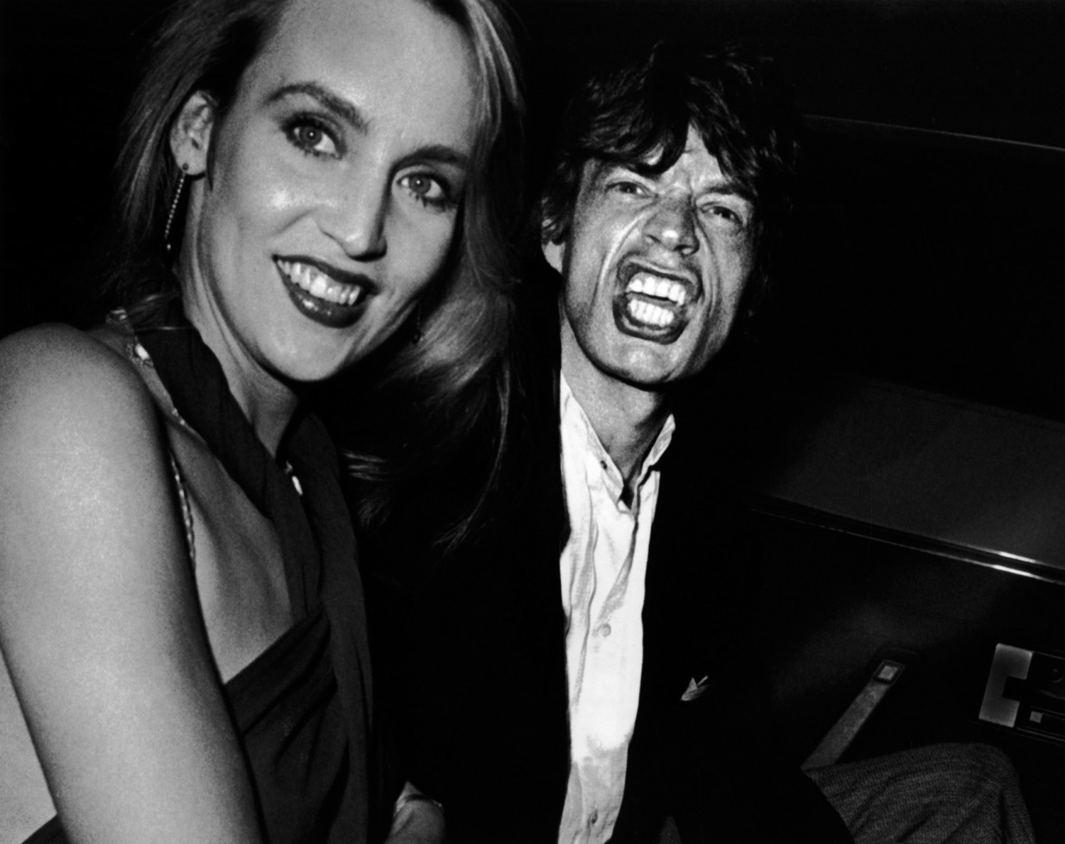 Mick Jagger with his girlfriend Jerry Hall photographed as they left the Limelight club. Sept. 19, 1984