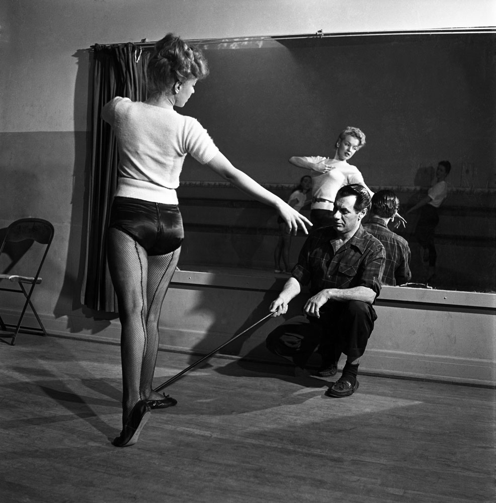 Marilyn Monroe, 22, takes dance lessons, Hollywood, 1949. Her instructor is Nico Charisse, ex-husband of the actress and dancer, Cyd Charisse.