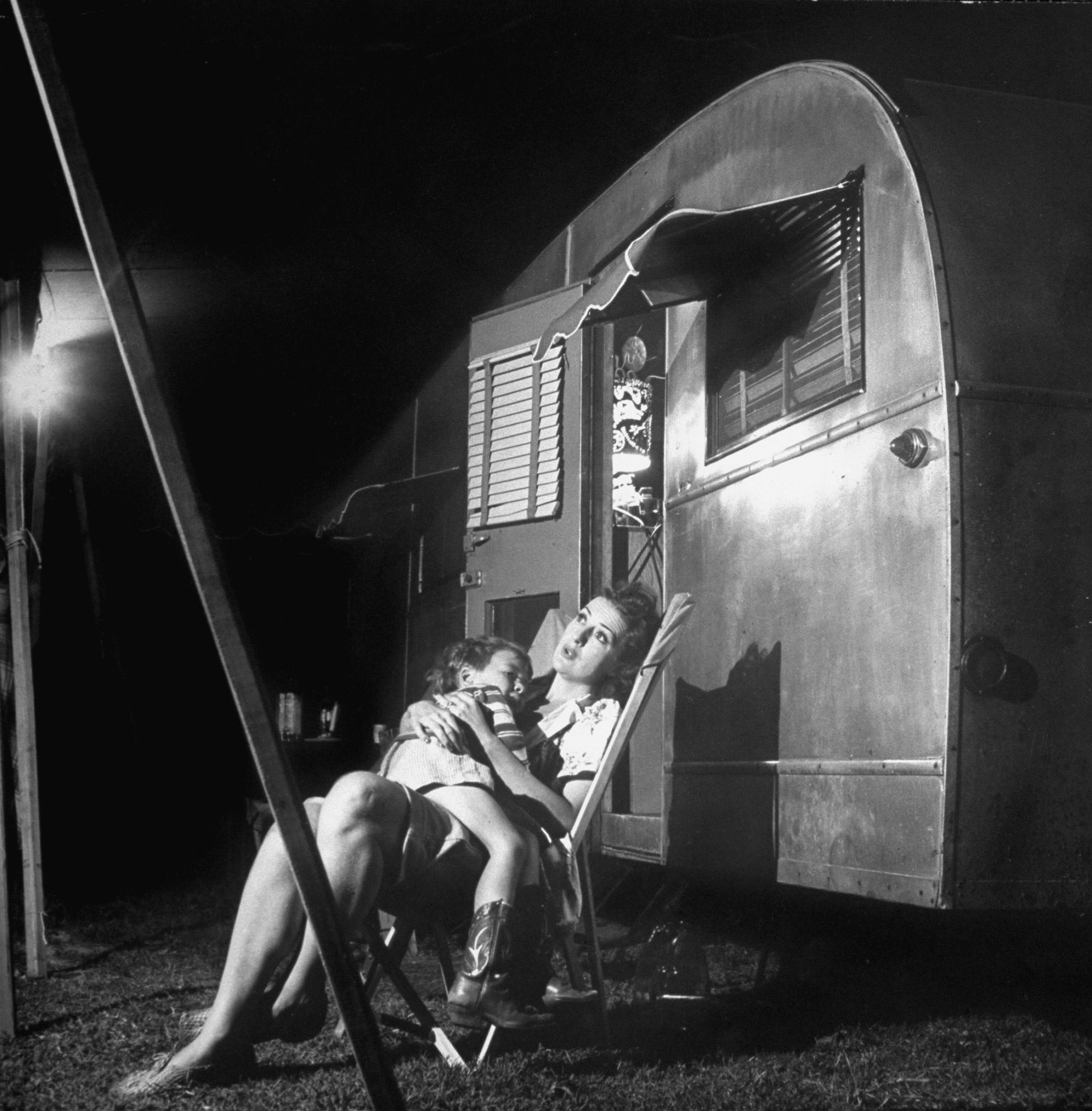 Burlesque star Gypsy Rose Lee holds her 4-year-old son, Erik Lee Kirkland, during a stopover in her traveling carnival show, Memphis, Tenn., 1949.