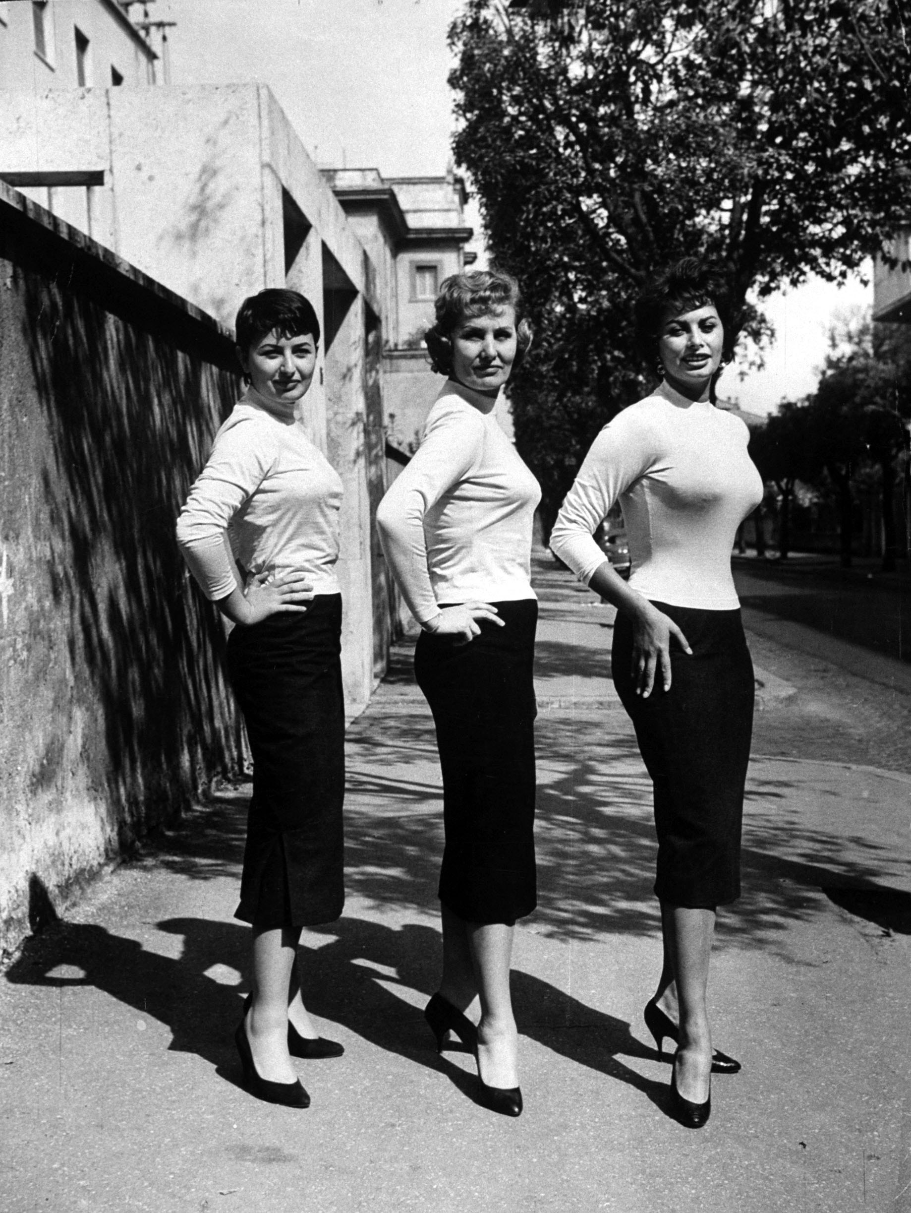 Sophia Loren (right) poses with her mother (center) and her sister, Maria, in 1957.